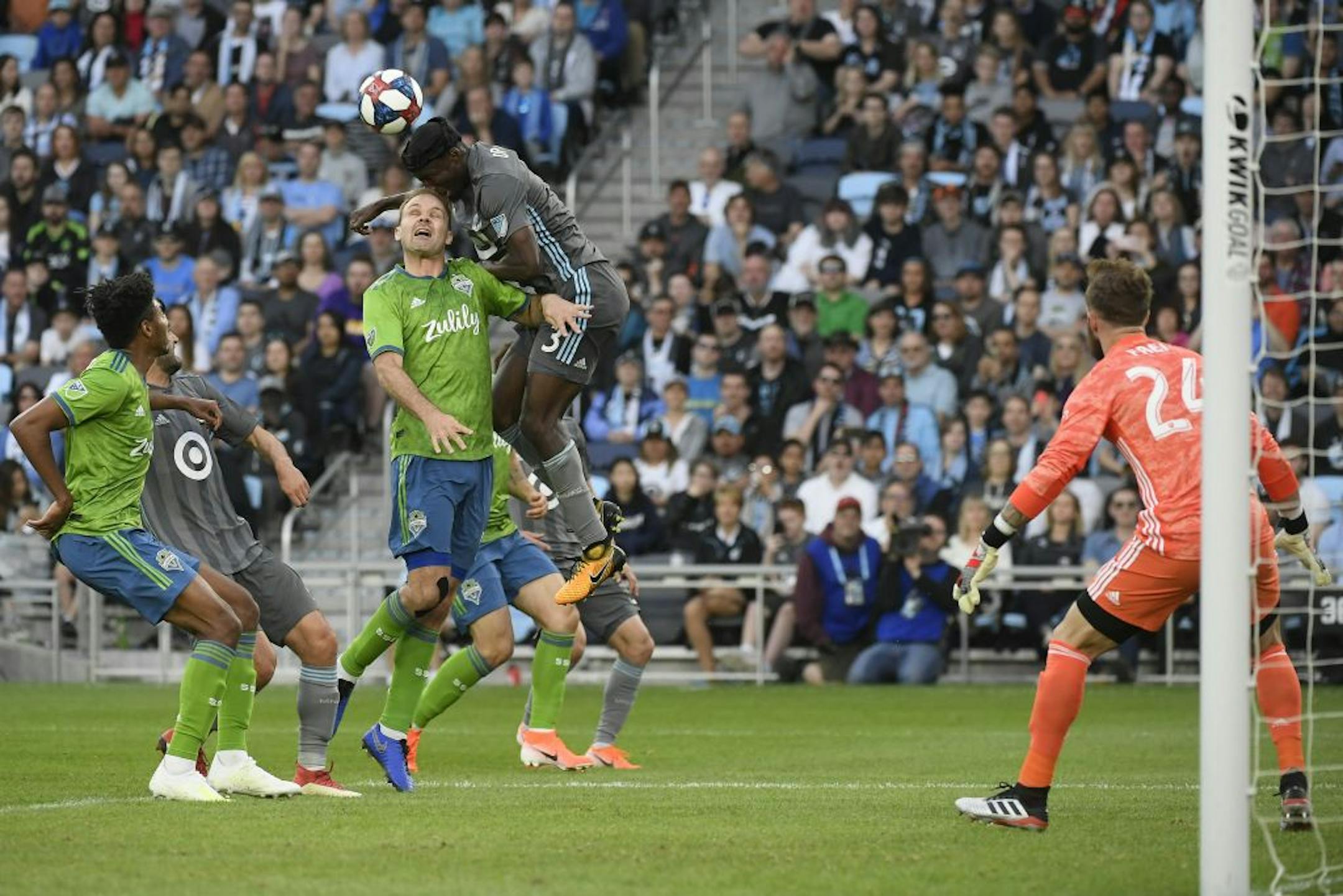 Minnesota United defender Ike Opara (3) scored a goal off a header as he collided with Seattle Sounders defender Chad Marshall (14) in the first half.