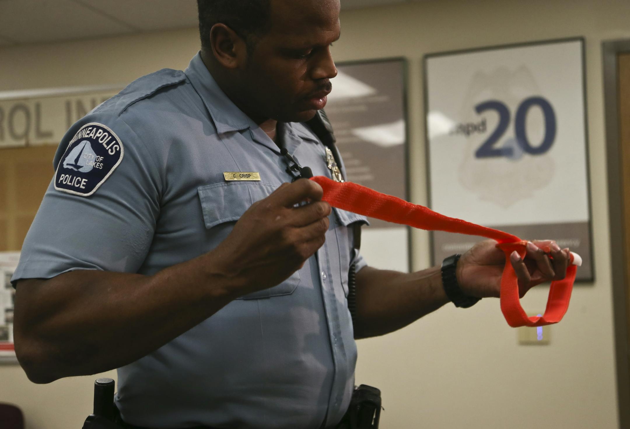 Officer Craig Crisp talked about the double stabbing he responded to earlier this week when a robber stabbed two U of M students. He was showing the tourniquet he used to stop one of them from bleeding. Photographed on Thursday, May 8, 2014 in Minneapolis, Minn. ] RENEE JONES SCHNEIDER • reneejones@startribune.com