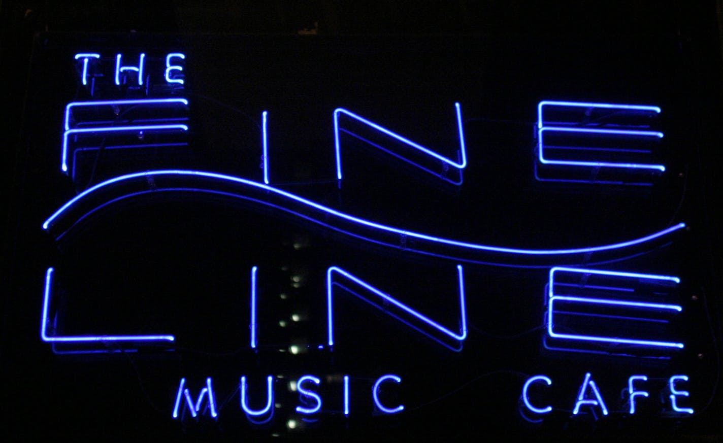 Minneapolis,MN;6/10/04:left to right:Sign for The Fine Line GENERAL INFORMATION: The Warehouse District in downtown Minneapolis mixes clubs that serve all kinds of people, offering music, drink and a chance to meet, mingle and dance ORG XMIT: MIN2013073017294306