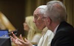 Pope Francis speaks in the Synod Hall during a conference on Modern Slavery and Climate Change at the Vatican, Tuesday, July 21, 2015. Dozens of envir