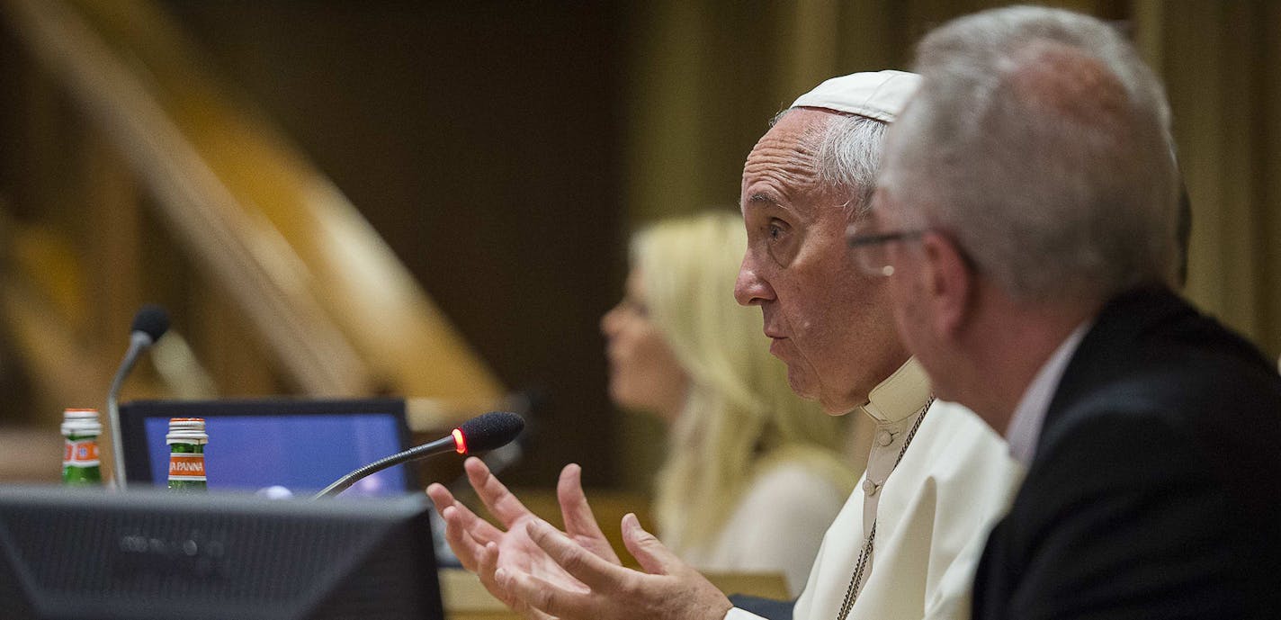 Pope Francis speaks in the Synod Hall during a conference on Modern Slavery and Climate Change at the Vatican, Tuesday, July 21, 2015. Dozens of environmentally friendly mayors from around the world are meeting at the Vatican this week to bask in the star power of eco-Pope Francis and commit to reducing global warming and helping the urban poor deal with its effects. (AP Photo/L'Ossservatore Romano, Pool) ORG XMIT: OSS103