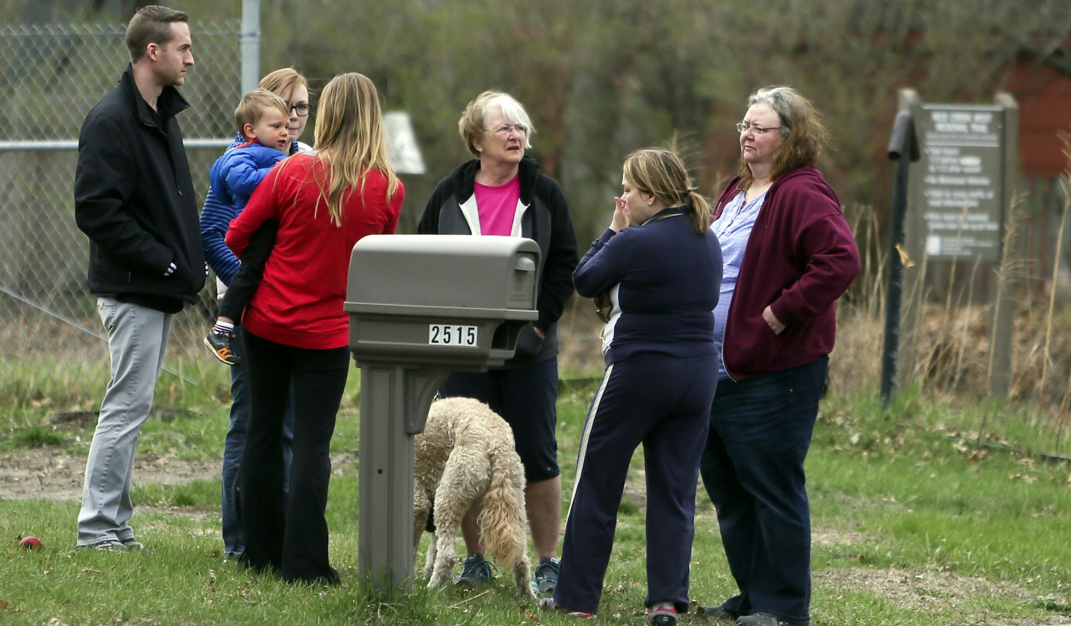 An ongoing dispute between neighbors over feeding deer erupted in gunfire Monday night in New Brighton. One man is dead, another victim is hospitalize. Here, neighbors gathered near the site of the shooting Tuesday, May 6, In New Brighton, MN.](DAVID JOLES/STARTRIBUNE) djoles@startribune An ongoing dispute between neighbors over feeding deer erupted in gunfire Monday night in New Brighton. One man is dead, another victim is hospitalized. Suspect, 57, turned himself into police. ORG XMIT: MIN1405