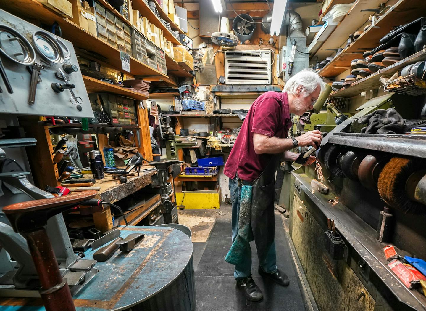 Sparks fly when Fast Eddie's Place owner Jim Picard grinds out a high heel on a pair of women's shoes. ] GLEN STUBBE &#x2022; glen.stubbe@startribune.com Wednesday, April 3, 2019 Hidden down a dark hallway in Dinkytown is an old-school shoe repair shop. Fast Eddie's Place. The longtime owner Jim Picard still fixes soles and heels the old fashioned way, surviving throw-away culture and Dinkytown's apartment craze. What's Happening at this time: Jim Picard, owner of Fast Eddie's Place, in the shop