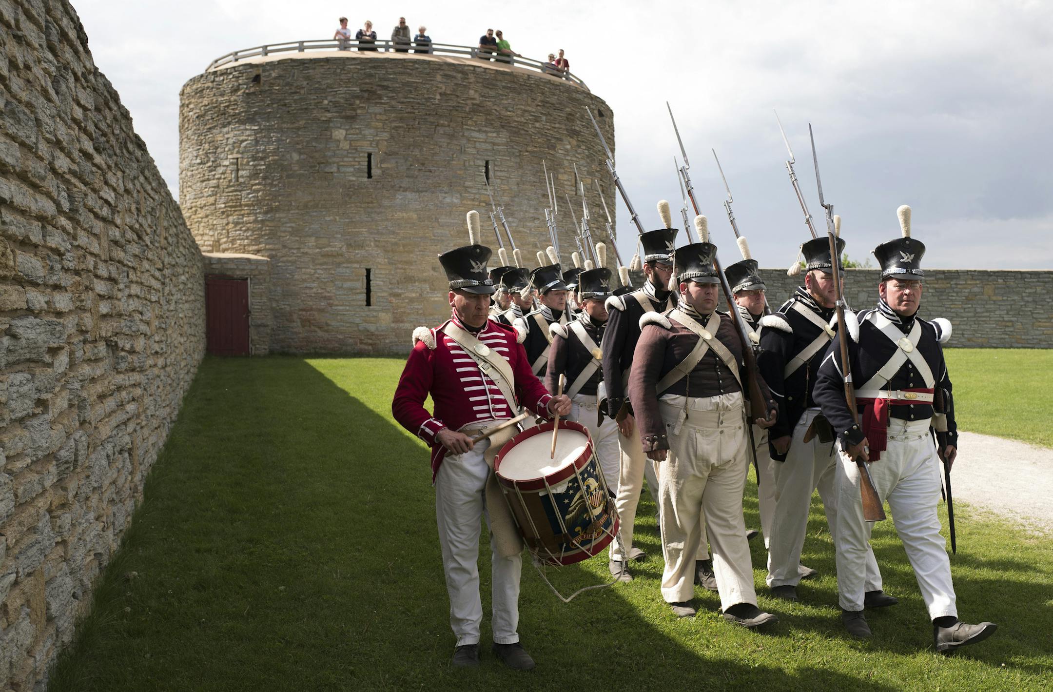 Redactors of the 5th Infantry Division marched to lower the flag during the summer opening season at Historic Fort Snelling Sunday May 28, 2017 in St. Paul, MN. ] JERRY HOLT ï jerry.holt@startribune.com