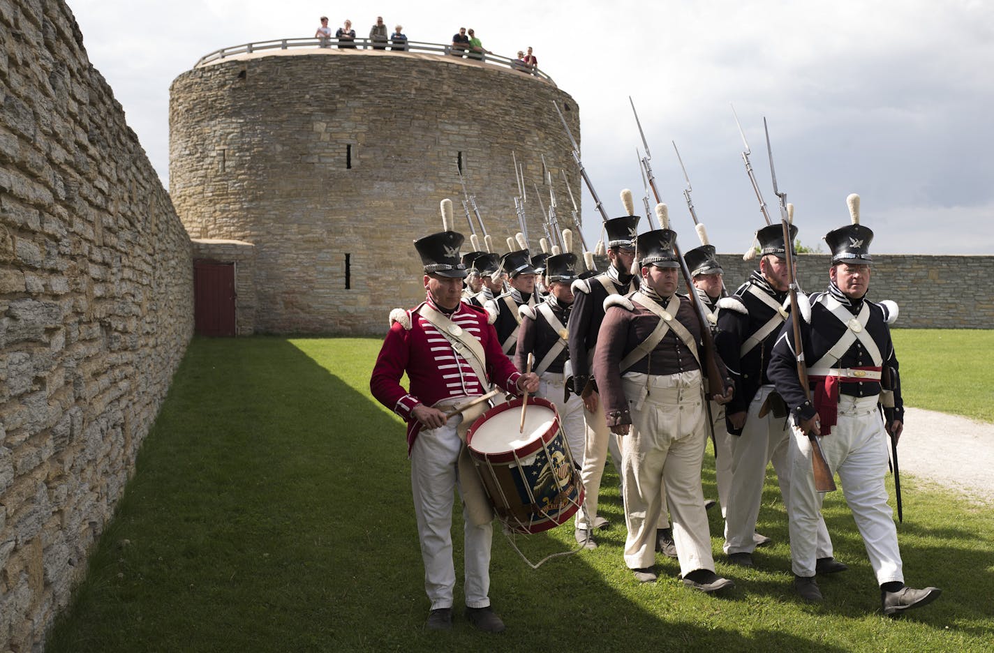 Redactors of the 5th Infantry Division marched to lower the flag during the summer opening season at Historic Fort Snelling Sunday May 28, 2017 in St. Paul, MN. ] JERRY HOLT &#xef; jerry.holt@startribune.com