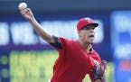 Minnesota Twins pitcher Jose Berrios throws against the Houston Astros in the first inning of a baseball game Thursday, Aug. 11, 2016 in Minneapolis.