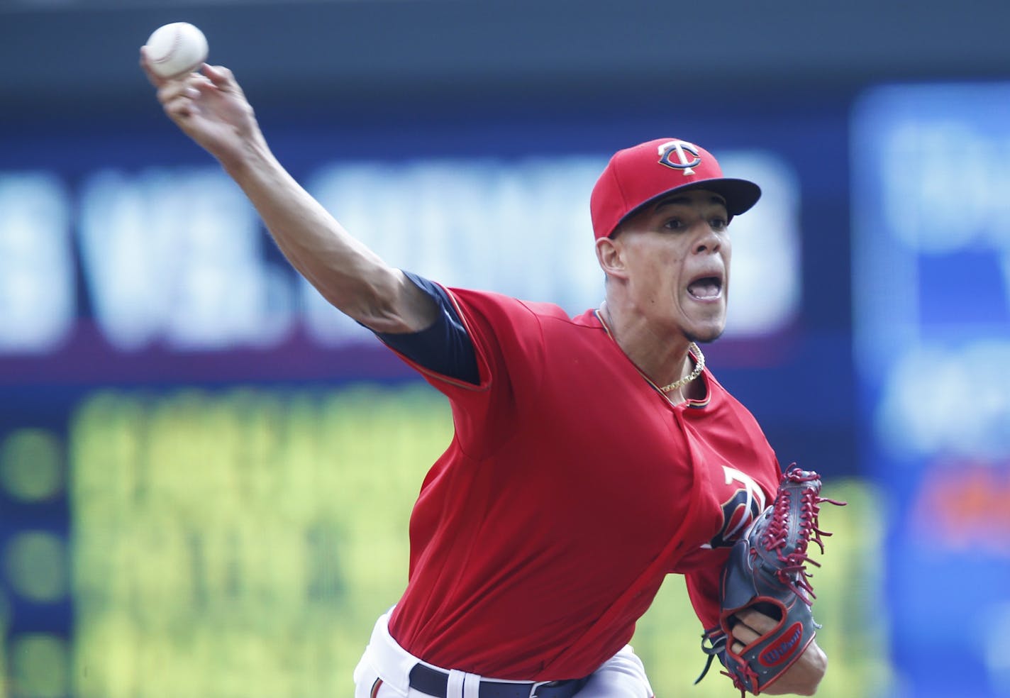 Minnesota Twins pitcher Jose Berrios throws against the Houston Astros in the first inning of a baseball game Thursday, Aug. 11, 2016 in Minneapolis.