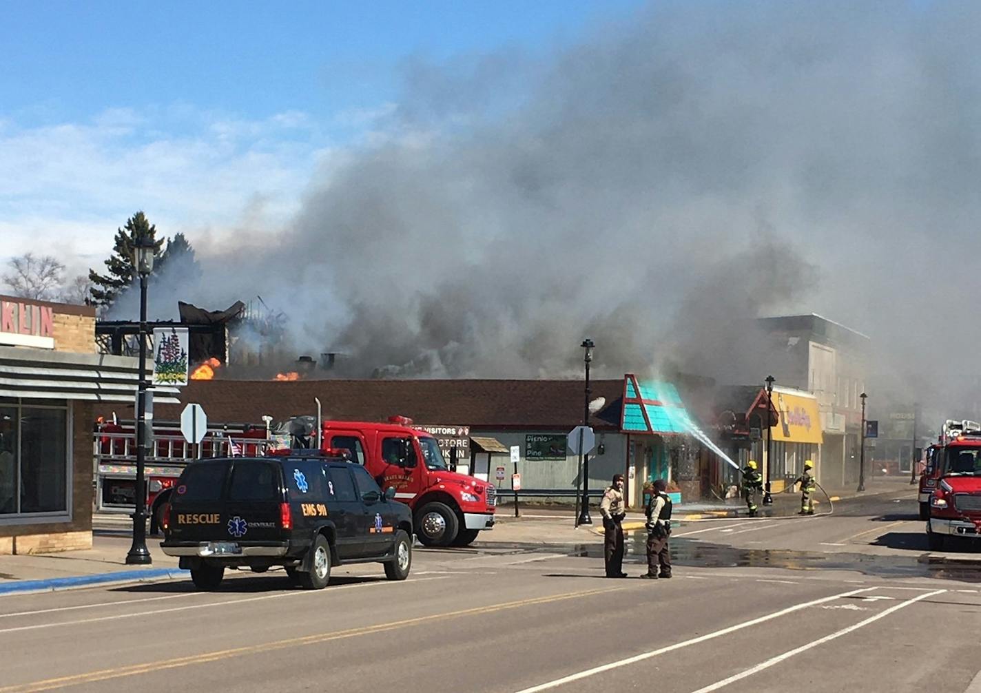 The Crooked Spoon, a popular tourist eatery, was engulfed in flames just after 1 p.m. and the fire spread to neighboring businesses on Monday, April 13, in Grand Marais.