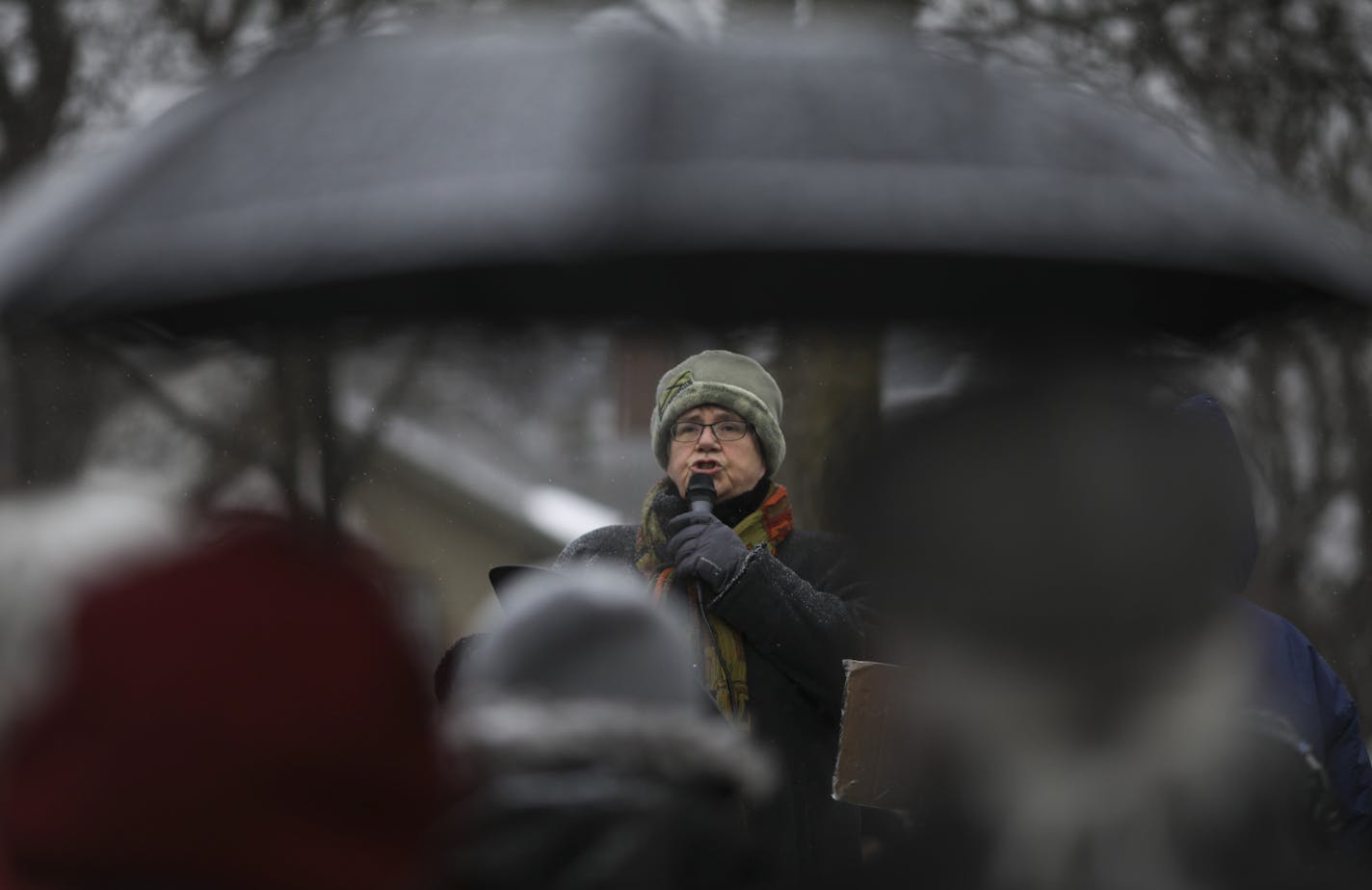 Fulton resident Katherine Hamberg was the first speaker to address the gathering. ] JEFF WHEELER &#xef; jeff.wheeler@startribune.com A rally was held Tuesday evening, March 20, 2018 near where Justine Damond was shot in Southwest Minneapolis last July after charges were brought against the Minneapolis Police officer who shot her. Nearly 100 people stood at the corner of W. 50th St. and Washburn Ave. S. to listen to speakers talk about the events of the day.