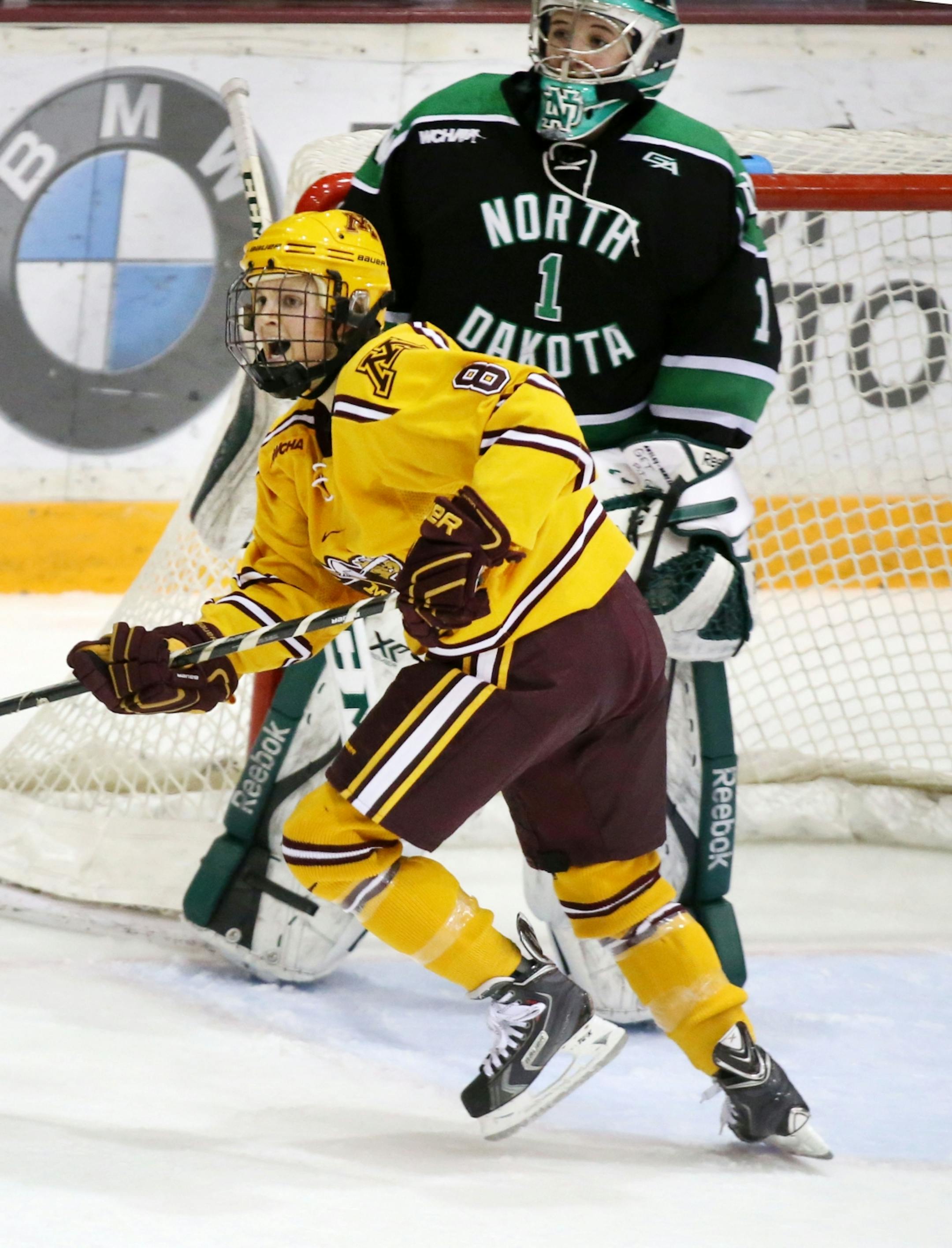 The University of Minnesota's Amanda Kessel looks for a pass as North Dakota goalie Shelby Amsley-Benzie looks on during the third period of the Gophers 3-0 win over the University of North Dakota Friday, Feb. 5, 2016, at Ridder Arena on the campus of the University of Minnesota in Minneapolis, MN.