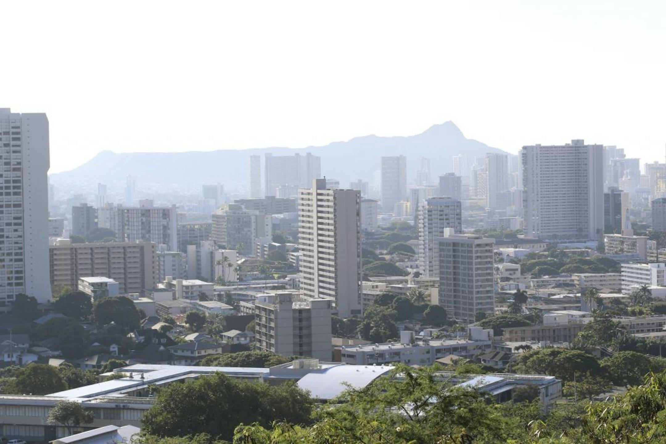 Diamond Head, an extinct volcanic crater, and high-rises are seen in Honolulu on Saturday, Jan. 13, 2018. Minnesotans visiting the sites in Hawaii on Saturday shared their stories of confusion and fear in wake of the faulty missile notice.