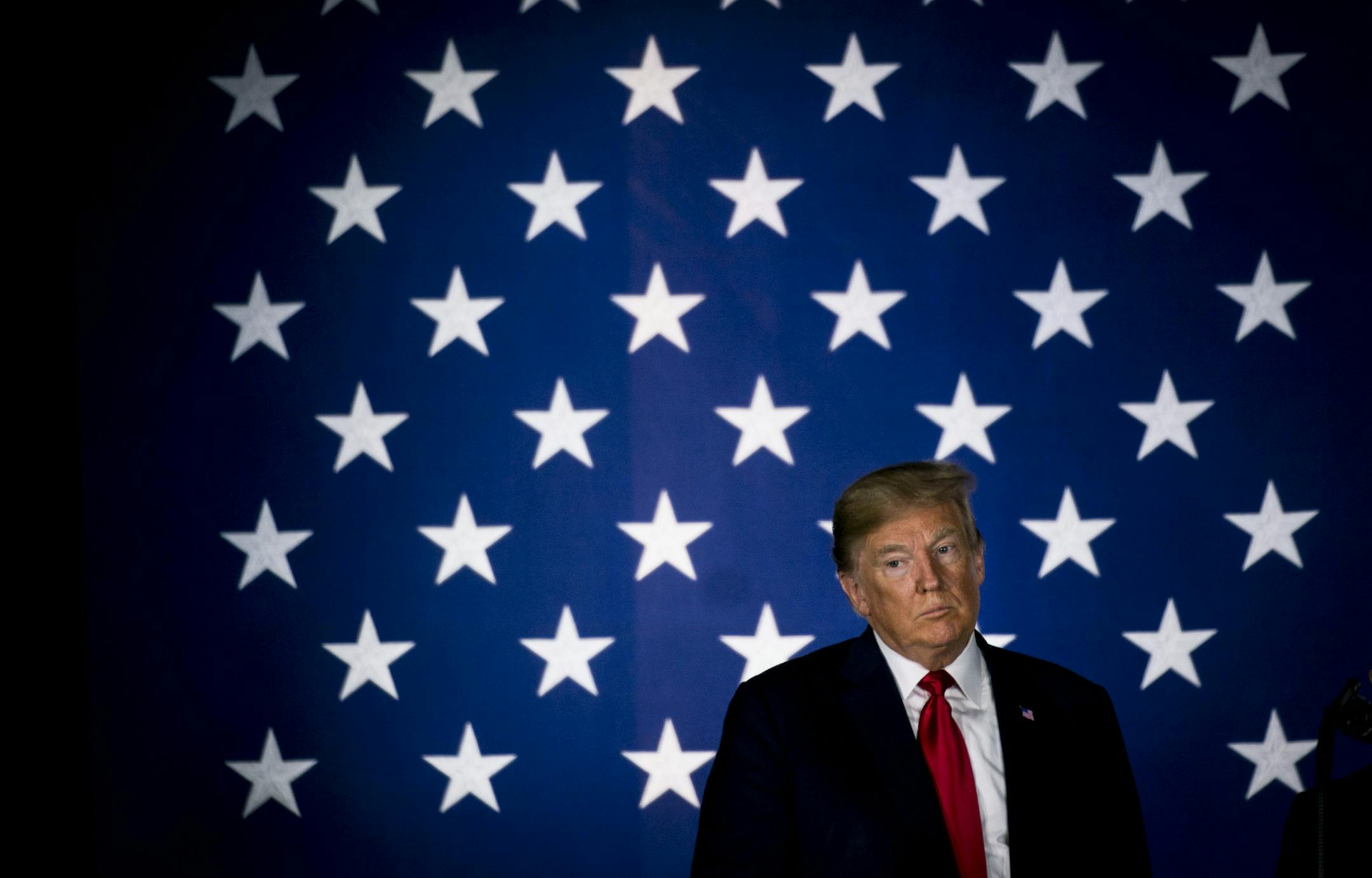 FILE -- President Donald Trump delivers remarks at an event in Fargo, N.D., Sept. 7, 2018. The many “distractions” generated by the president, Mitch McConnell said at an event last week, were preventing Republicans from having a coherent message focused on the economy, according to multiple people who were briefed on the remarks. (Doug Mills/The New York Times)