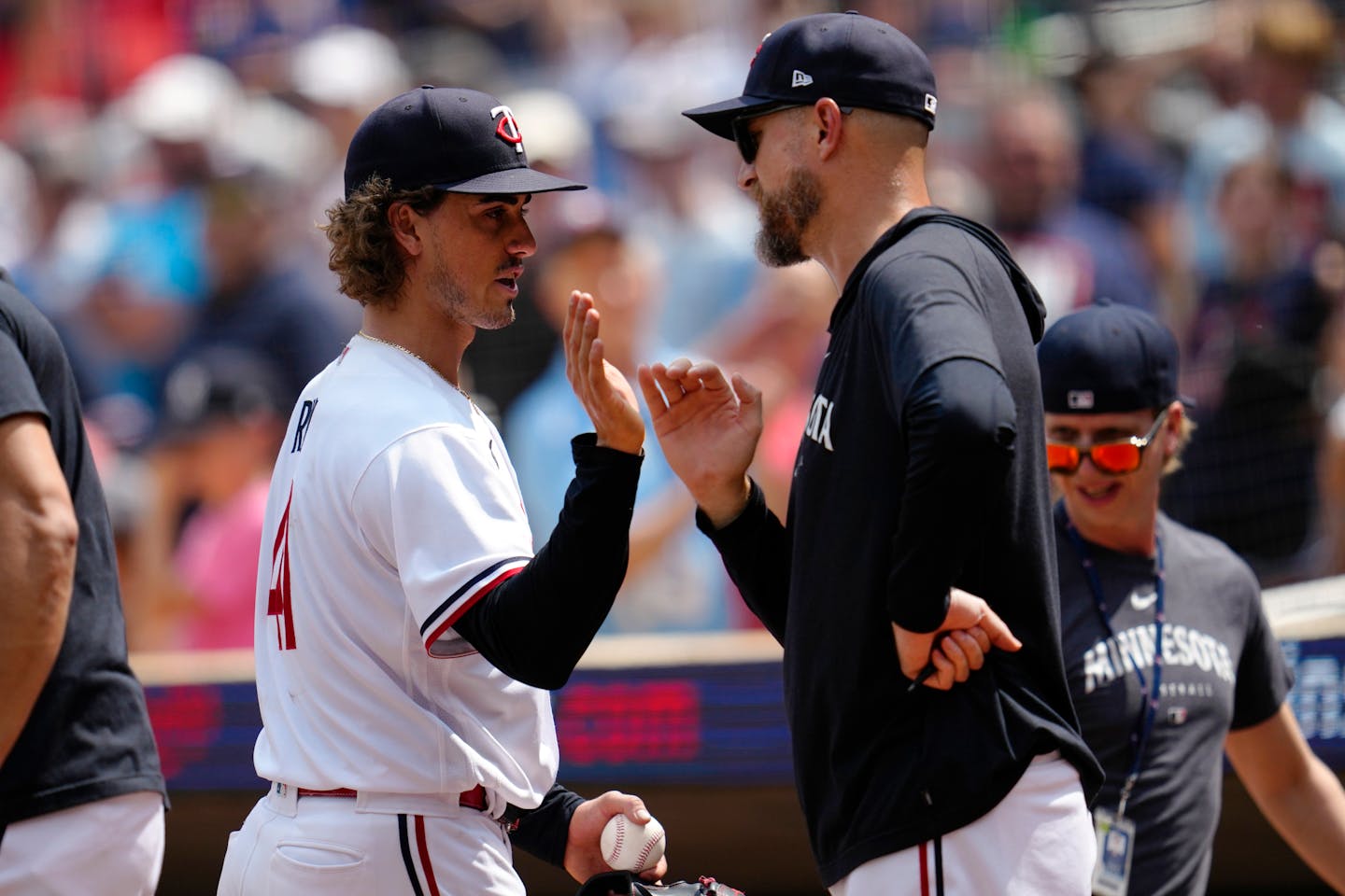 Minnesota Twins starting pitcher Joe Ryan, left, celebrates with manager Rocco Baldelli after their 6-0 win in a baseball game against the Boston Red Sox, Thursday, June 22, 2023, in Minneapolis. (AP Photo/Abbie Parr)