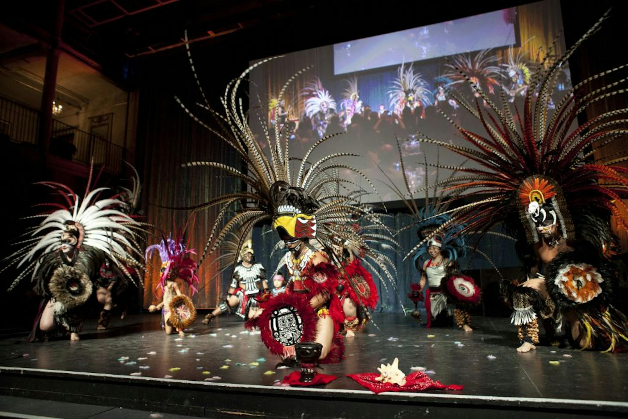 Dancers from COMPAS perform a traditional Aztec dance at Children's Starry Night, a fundraiser, held Oct. 12 at Aria at the Jeune Lune in Minneapolis. The event helped raise funds for the Arts & Healing Project at Children's Hospitals and Clinics of Minnesota.