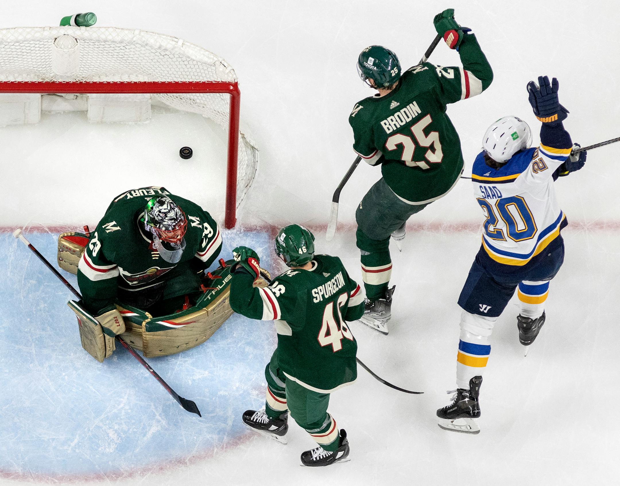 Brandon Saad (20) of the St. Louis Blues gets the puck past Minnesota Wild goalie Marc Andre Fleury (29) for a goal in the second period.
