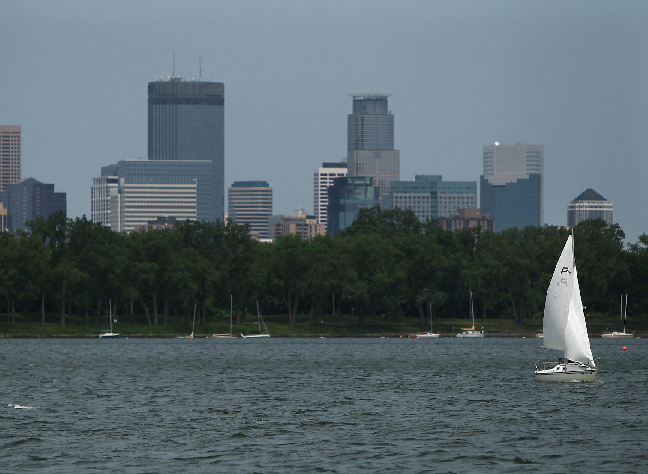 ELIZABETH FLORES • eflores@startribune.com June 14, 2011 - Minneapolis, MN - As secretary of war 1817-25, John C. Calhoun ordered the establishment of Fort Snelling. But it was his standing as a passionate pro-slavery orator that prompted local Civil War history buff John Winters to suggest the name change. IN THIS PHOTO:] Boaters made their way around Lake Calhoun. ORG XMIT: MIN2015062212323031 ORG XMIT: MIN1506221235420484