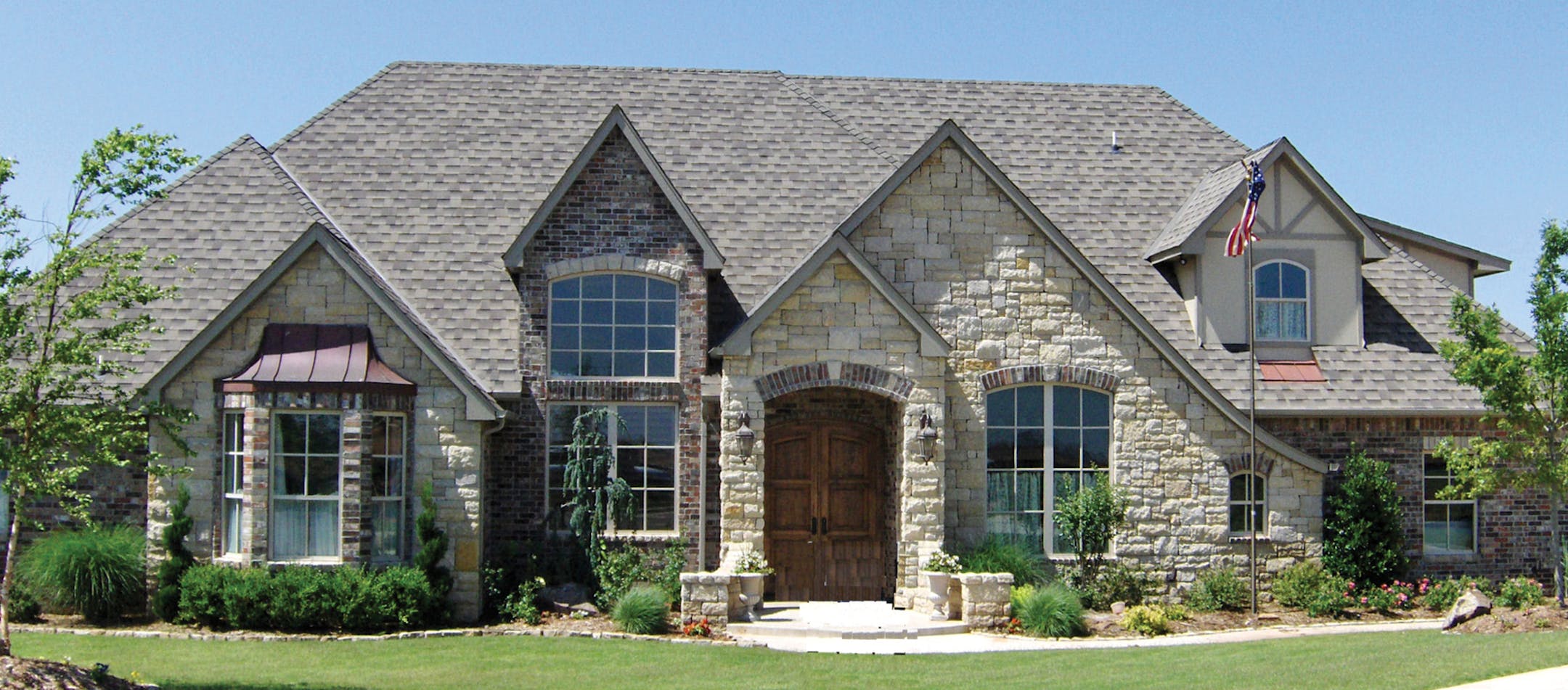 A home plan with French country flair.
