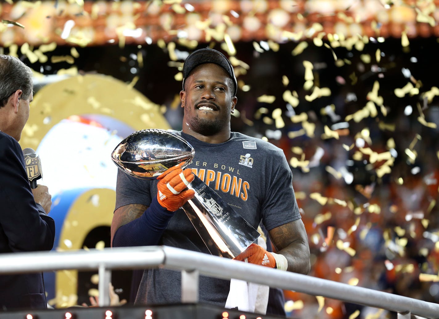 Broncos linebacker Von Miller with the Vince Lombardi Trophy after beating the Carolina Panthers 24-10 in Super Bowl 50 on Sunday.