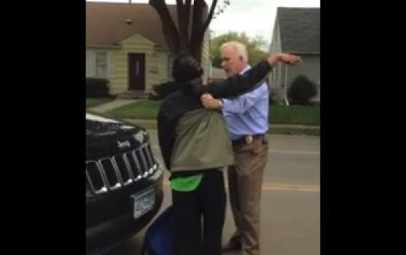 A video of an Edina police officer stopping and arresting a black man walking on a street around a construction area has gone viral on social media.