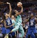 Epiphanny Prince(10) goes up for a shot between Seimone Augustus(33) and Sylvia Fowles(34) .