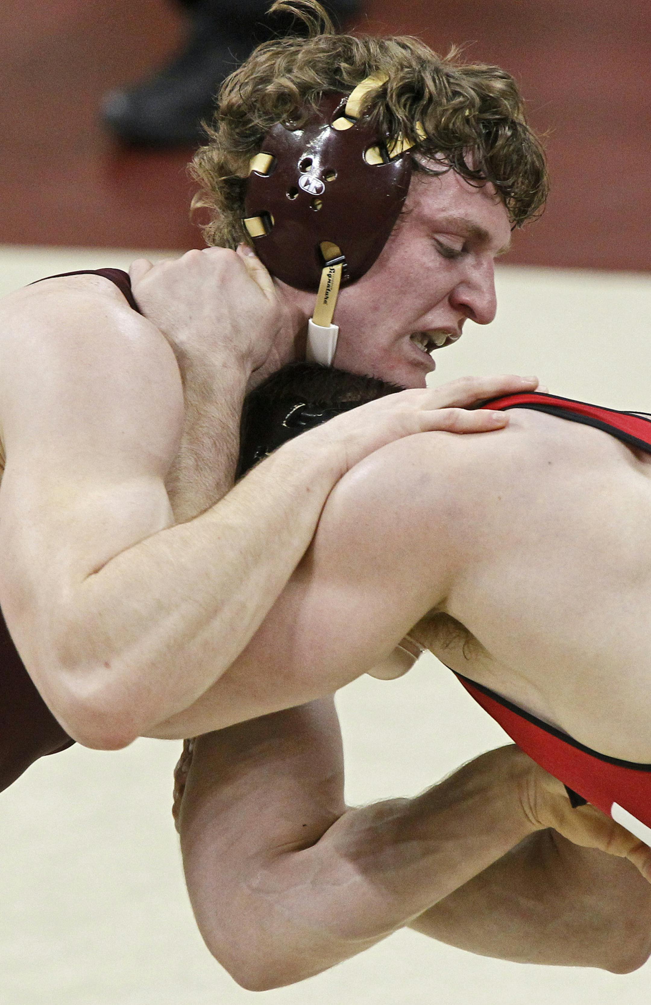 MARLIN LEVISON*mlevison@startribune.com GENERAL INFORMATIONMinnesota Gophers vs. Wisconsin wrestling. Minnesota won 21-15. IN THIS PHOTO: ] Minnesota's Kevin Steinhaus and Wisconsin's Travis Rutt wrestled in the 184 lb match. Steinhaus, top lost the match to Rutt. ORG XMIT: MIN2013030821450887