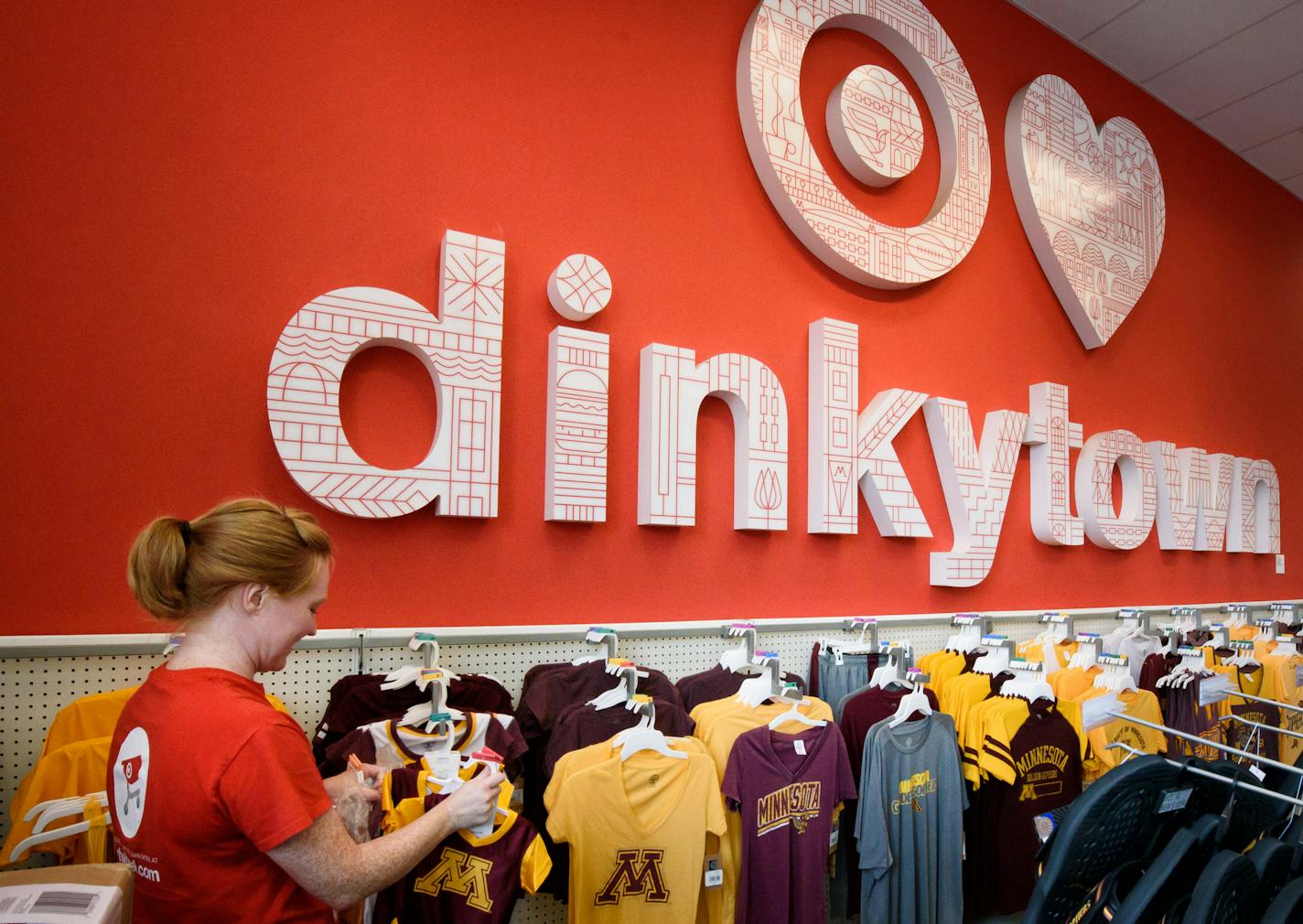 Manager Jennifer Souchtchenko added some University of Minnesota branded clothes in the store. The Dinkytown Target store opened two years ago and attracts students and parents shopping for students. ] GLEN STUBBE * gstubbe@startribune.com Tuesday, August 16, 2016 The Dinkytown Target store opened two years ago and attracts students and parents shopping for students.