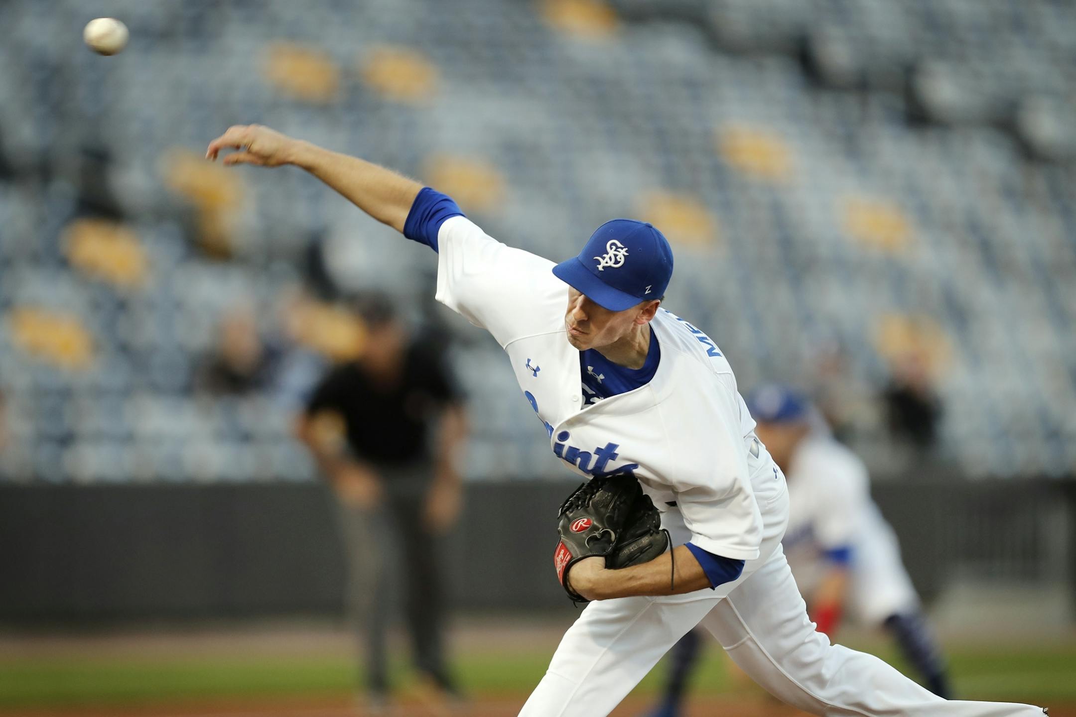 Saint Paul Saints pitcher Eddie Medina pitches in the first inning.