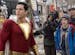 This image released by Warner Bros. shows Zachary Levi, left, and Jack Dylan Grazer in a scene from "Shazam!" (Steve Wilkie/Warner Bros. Entertainment