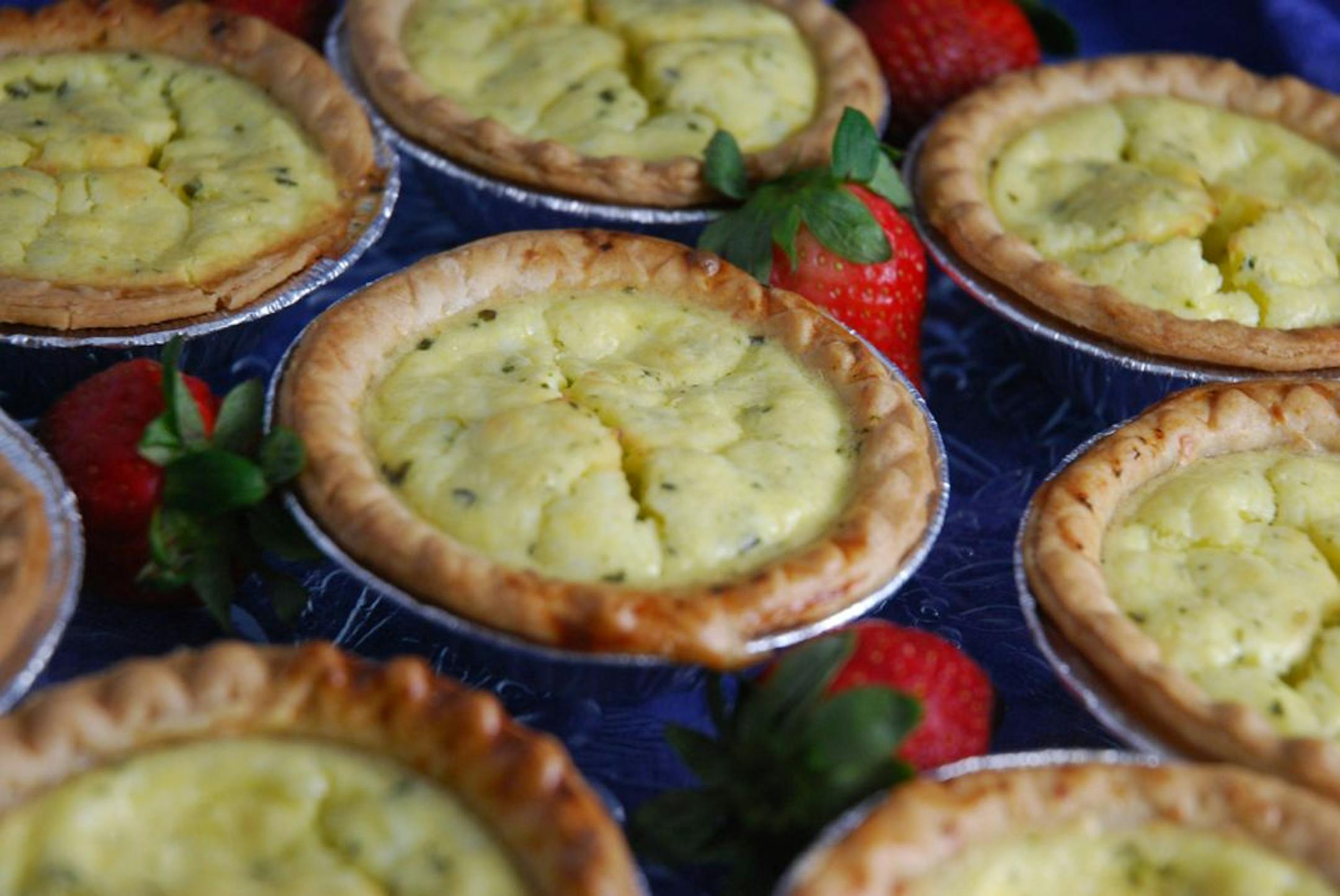 Individual sized quiches perfect for entertaining.
