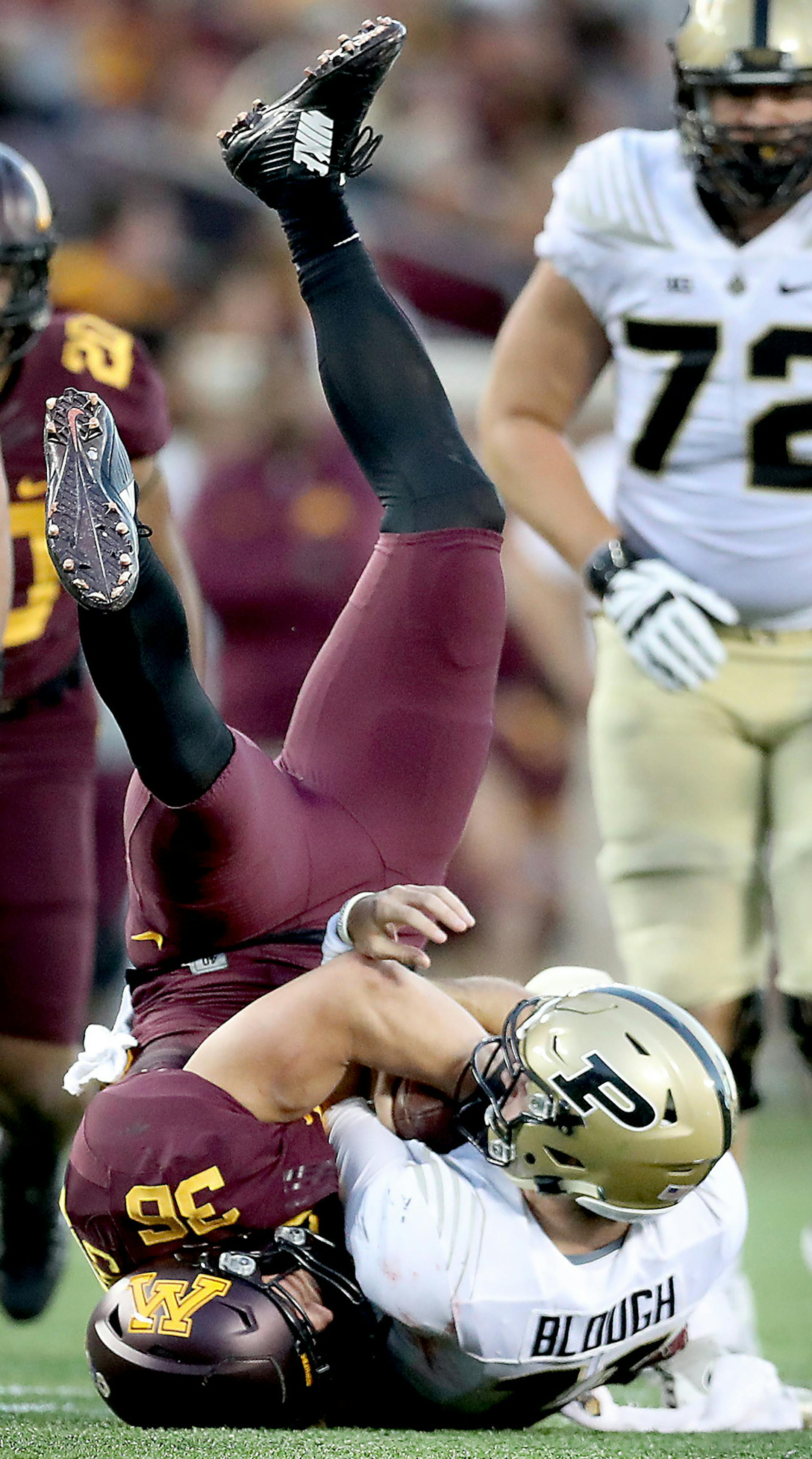 Minnesota's linebacker Blake Cashman sacked Purdue's quarterback David Blough during the third quarter as Minnesota took on Purdue at TCF Bank Stadium, Saturday, November 5, 2016 in Minneapolis, MN. ] (ELIZABETH FLORES/STAR TRIBUNE) ELIZABETH FLORES &#x2022; eflores@startribune.com