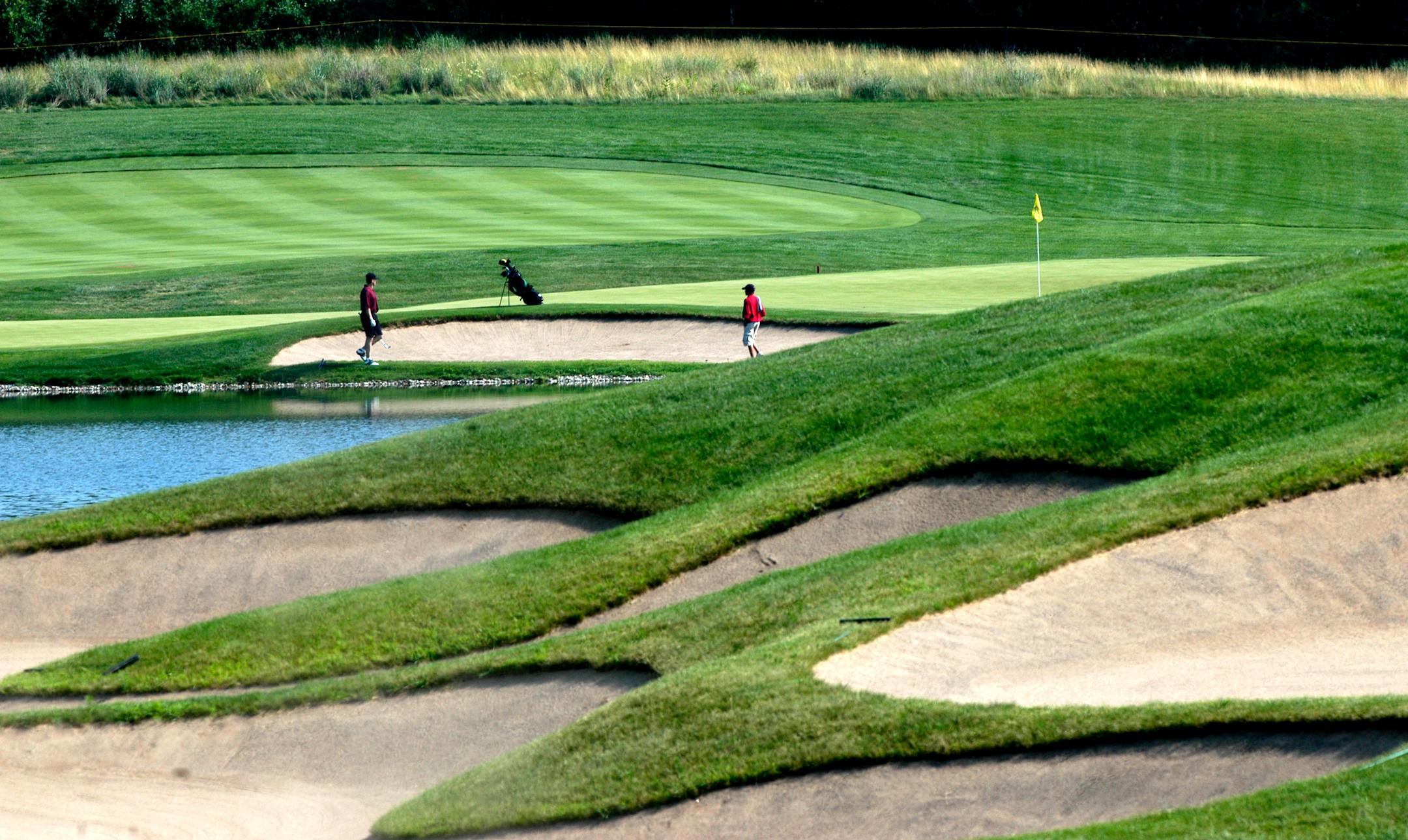 At courses like Troy Burne in Hudson, Wis., workers are being allowed to maintain courses at an important time when they transition from winter.