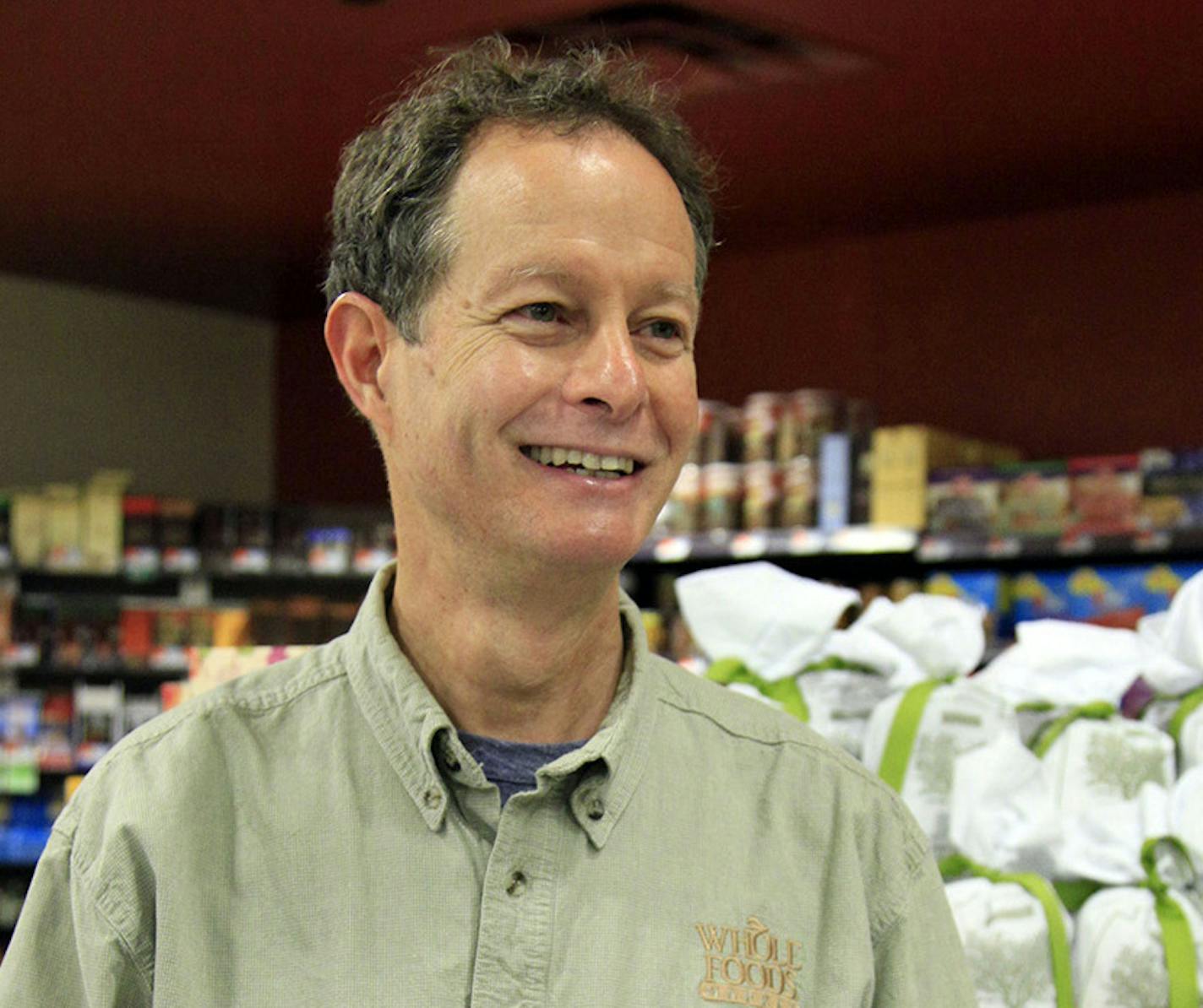 In this Nov. 18, 2009 photo, Whole Foods CEO John Mackey is photographed in one of his stores on New York's Upper West Side. (AP Photo/Richard Drew) ORG XMIT: NYRD206