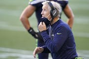 Seattle Seahawks head coach Pete Carroll reacts on the sidelines during the second half of an NFL football game against the Dallas Cowboys, Sunday, Se