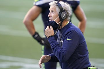 Seattle Seahawks head coach Pete Carroll reacts on the sidelines during the second half of an NFL football game against the Dallas Cowboys, Sunday, Se