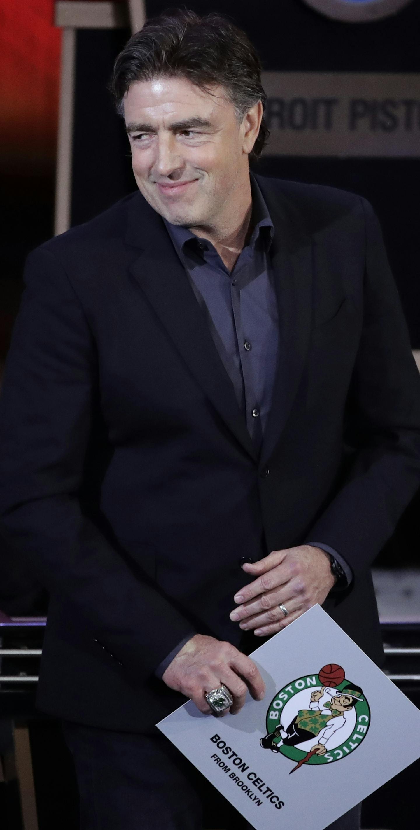 Boston Celtics co-owner Wyc Grousbeck smiles after the learning the Celtics were awarded the No. 1 pick in the NBA basketball draft, at the draft lottery Tuesday, May 16, 2017, in New York. (AP Photo/Frank Franklin II)