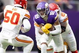 Vikings receiver Justin Jefferson had three catches for 28 yards Sunday before leaving with an injury in the fourth quarter. 