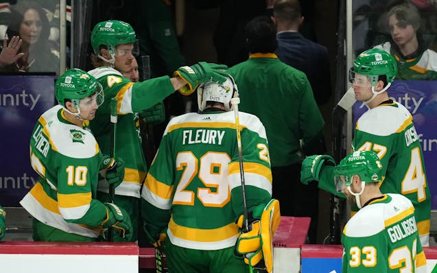 Goaltender Marc-Andre Fleury and dejected teammates leave the ice after a deflating loss to the Jets on April 6. The Wild went 0-10-1 against Central 