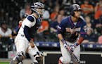 Jorge Polanco watches his two-run home run off Astros pitcher Chris Devenski in April