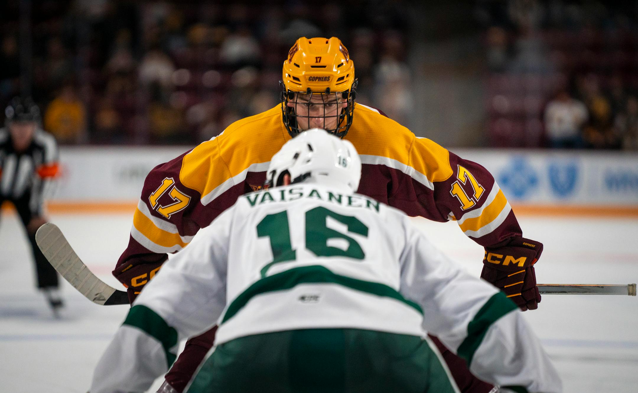 Minnesota's Brody Lamb (17) faces off with Bemidji State's Jere Vaisanen (16) at their exhibition game.