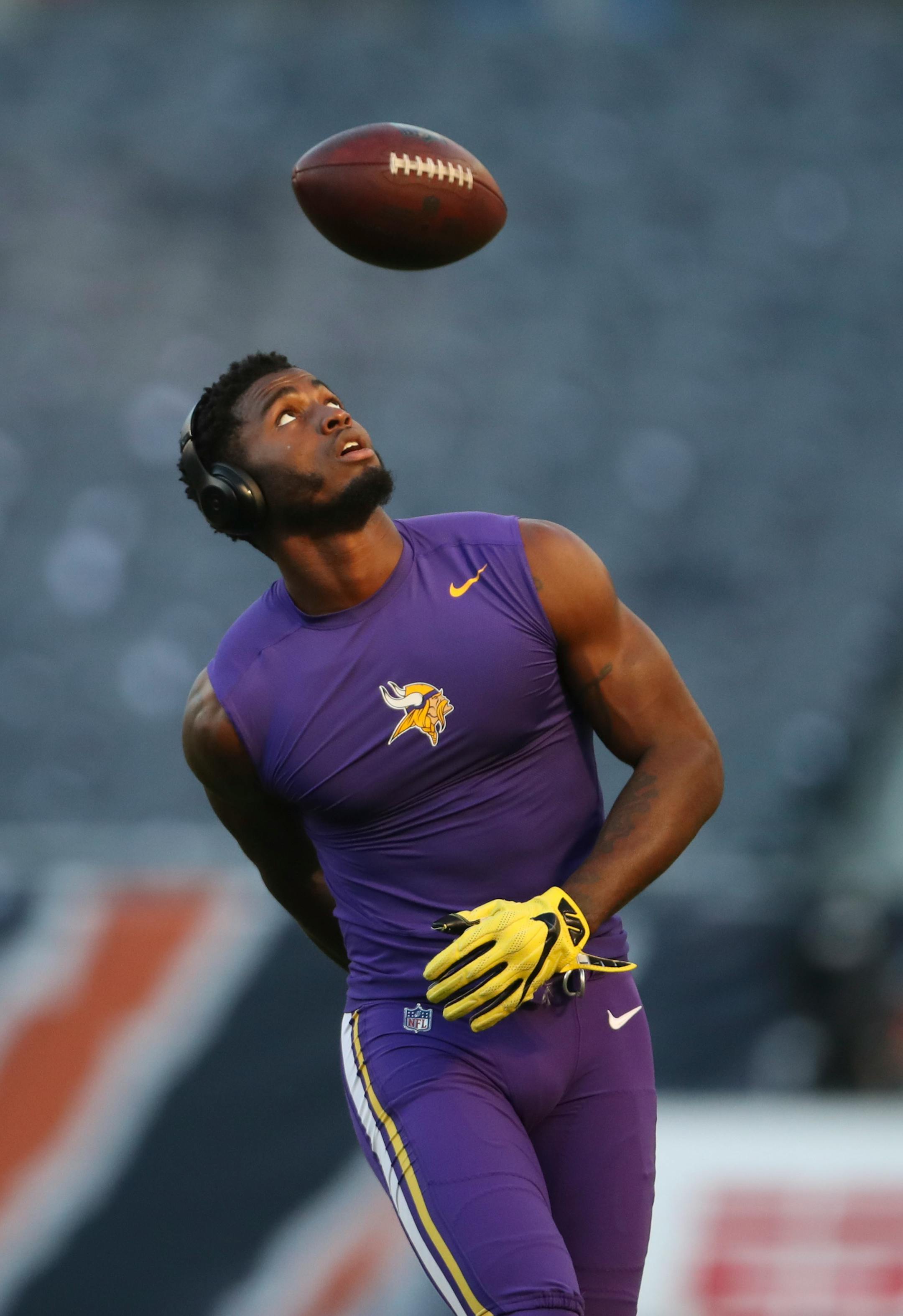 Minnesota Vikings wide receiver Laquon Treadwell threw the ball to himself from behind his back will warming up before Monday night's game in Chicago.