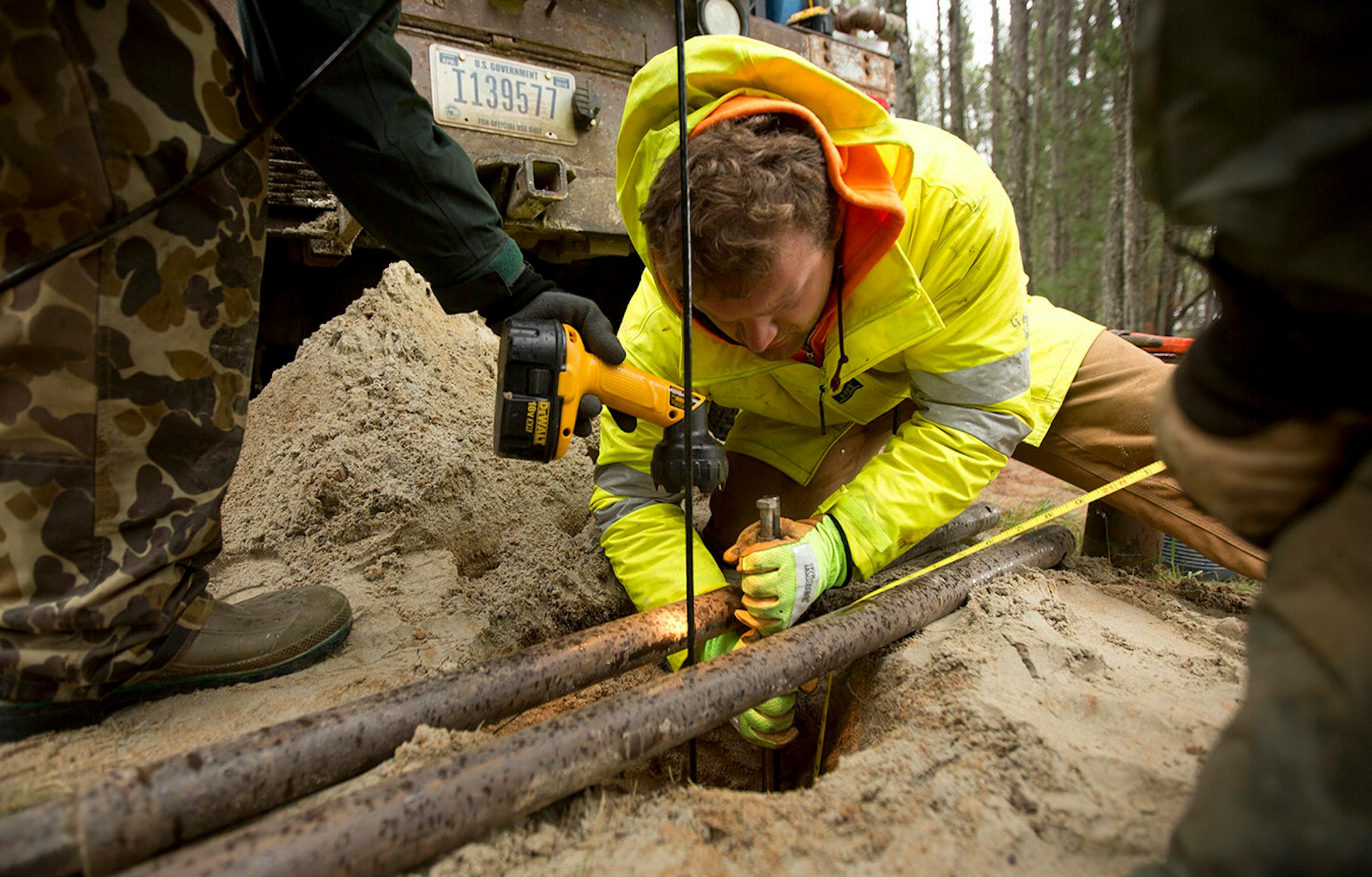 At the site of 1979 spill near Bemidji, scientists have dotted the landscape with bore holes to study of the lingering underground pollution. Here, crews bore 27 feet below the surface to survey the groundwater for oil from the 1979 spill.