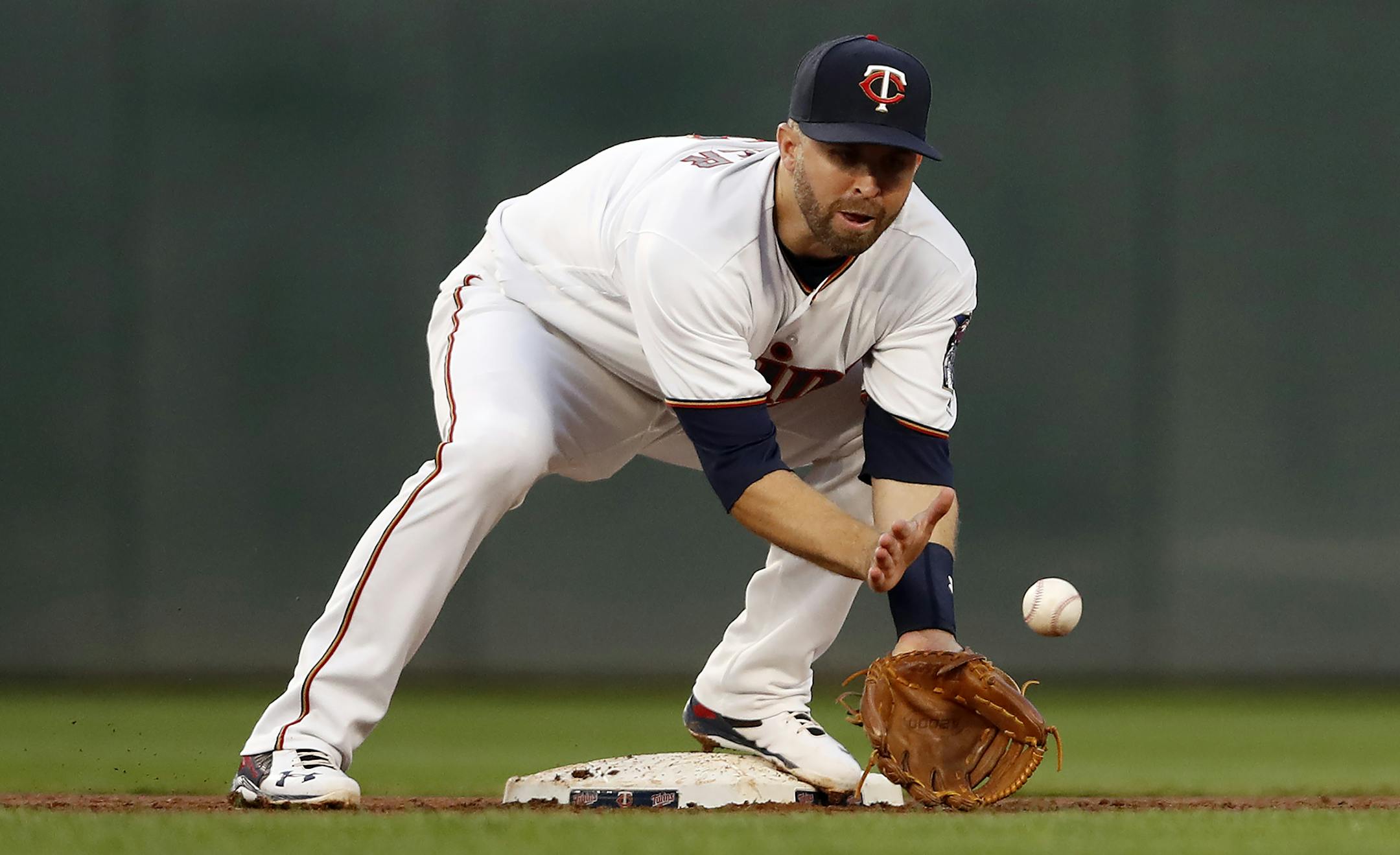 Second baseman Brian Dozier has been lobbying to play, but Wednesday’s rainout will give his ankle another day to heal.
