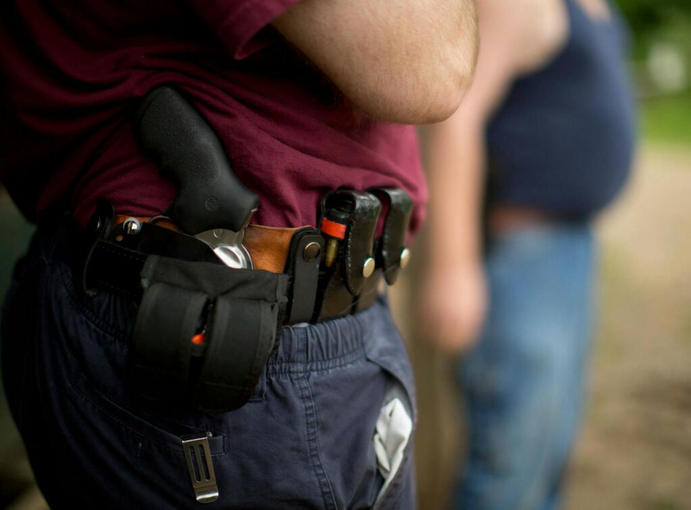 Pat Cannon, 59, of Minneapolis, is representative of the population who have qualified for concealed carry pistol permits in Minnesota. He bought a handgun, got trained and got his permit both for protection and for the enjoyment of shooting in competitions. Wednesday night, June 20, 2012, he shot in a pistol competitive league at the Faribault Rifle &amp; Pistol Club in Kilkenny. Pat Cannon's Ruger revolver was holstered inside his belt while he was between shooting stations in his league on June 20, 2012. ] JEFF WHEELER â€¢ jeff.wheeler@startribune.com