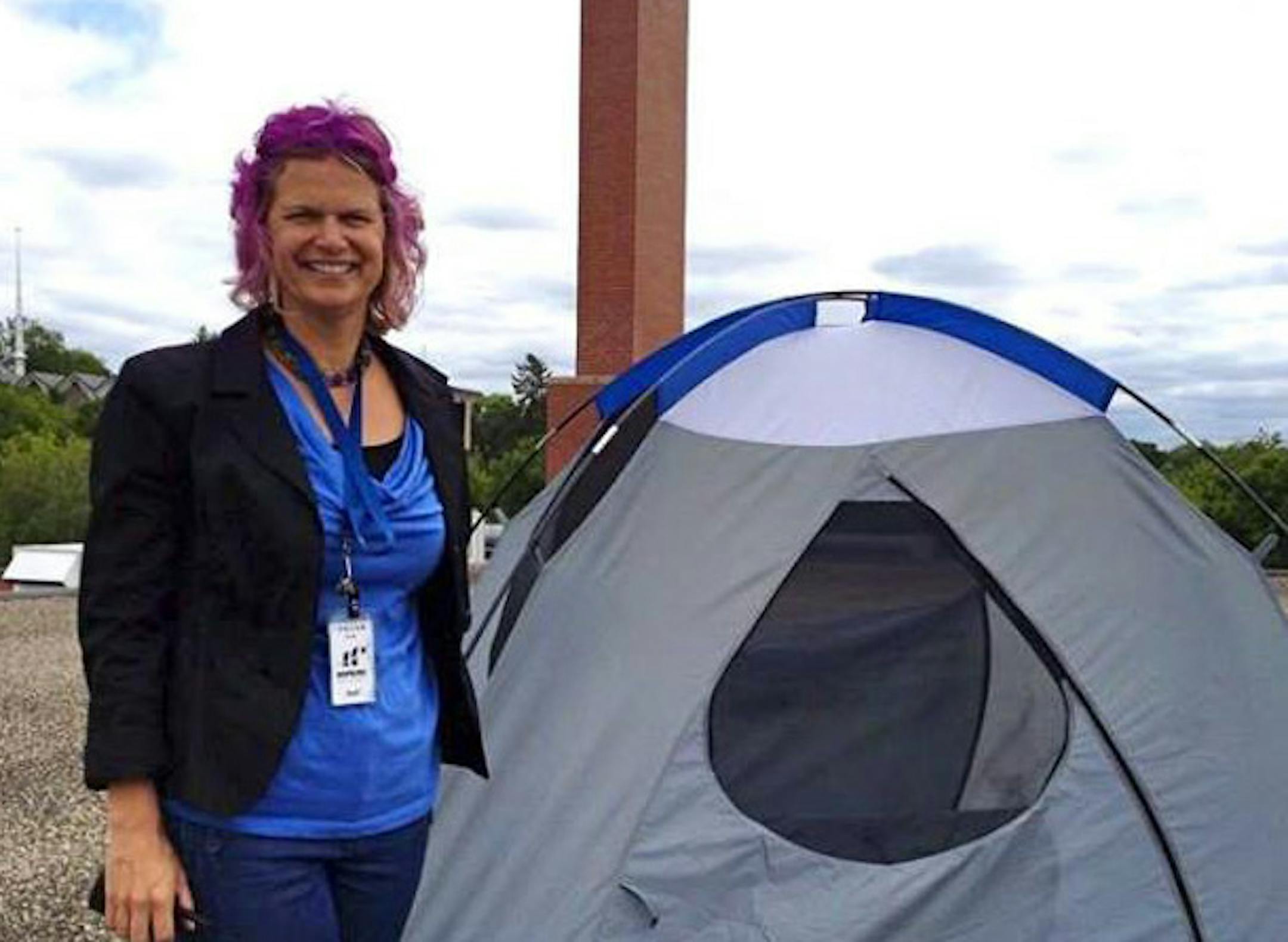 Jody De St. Hubert, principal of Alice Smith Elementary in Hopkins, dyed her hair purple after students made good on a bet.