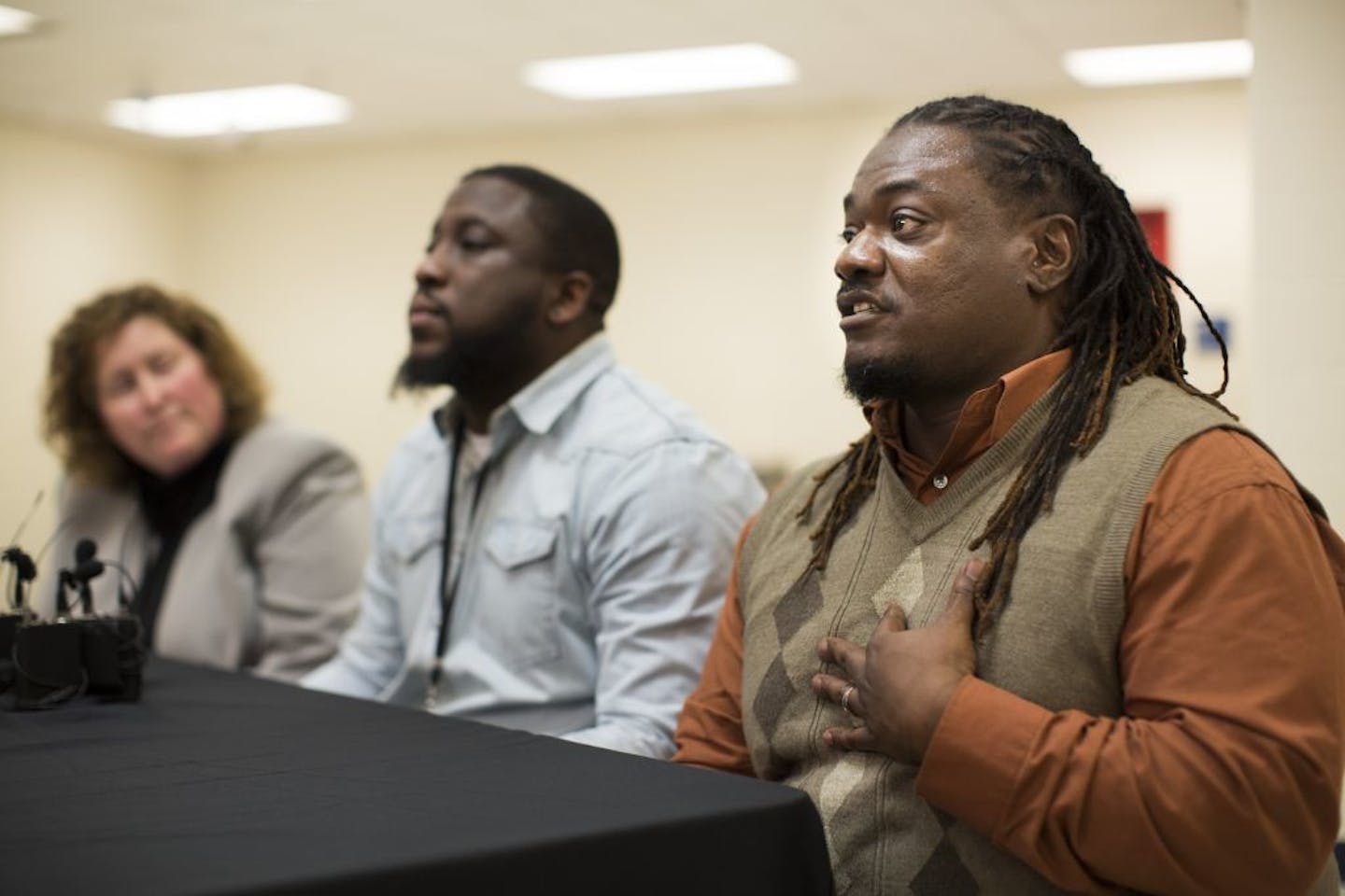 Special education teacher Jimmie Peterson pointed to his heart saying this school and what he does comes from the heart as he spoke at a press conference at Harrison School after an incident of violence on the principal, photographed on Thursday, January 7, 2015, in Minneapolis, Minn.