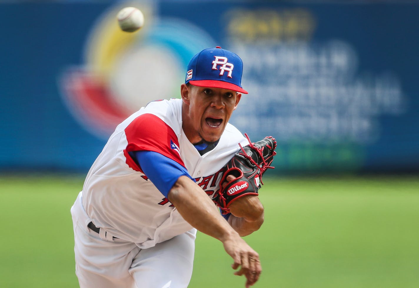 Puerto Rico's starting pitcher Jose Berrios delivers during the first inning of a game against Italy at the World Baseball Classic in Guadalajara, Mexico, Sunday, March 12, 2017. (AP Photo/Luis Gutierrez)