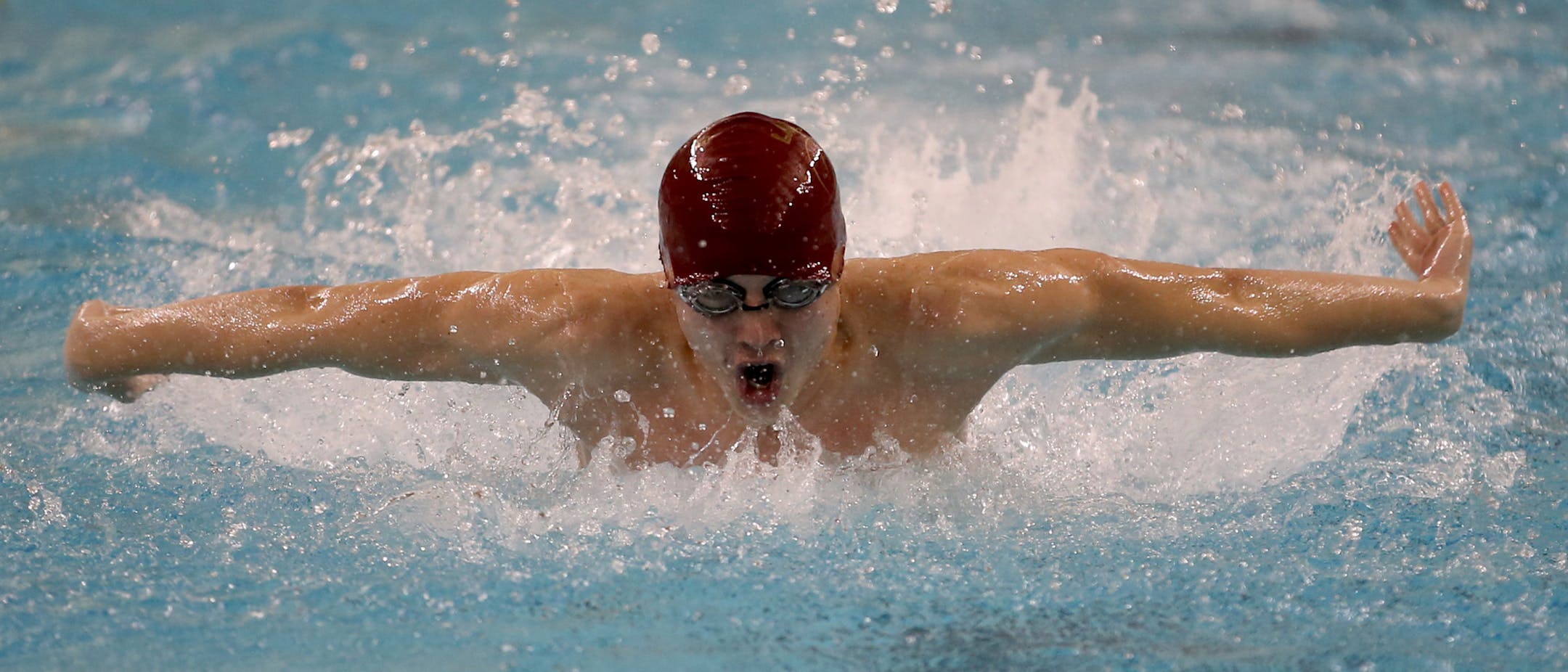 Sophomore Andrew Lind swam the butterfly in the third leg of a 200 yard medley relay heat. (Kyndell Harkness/Star Tribune)