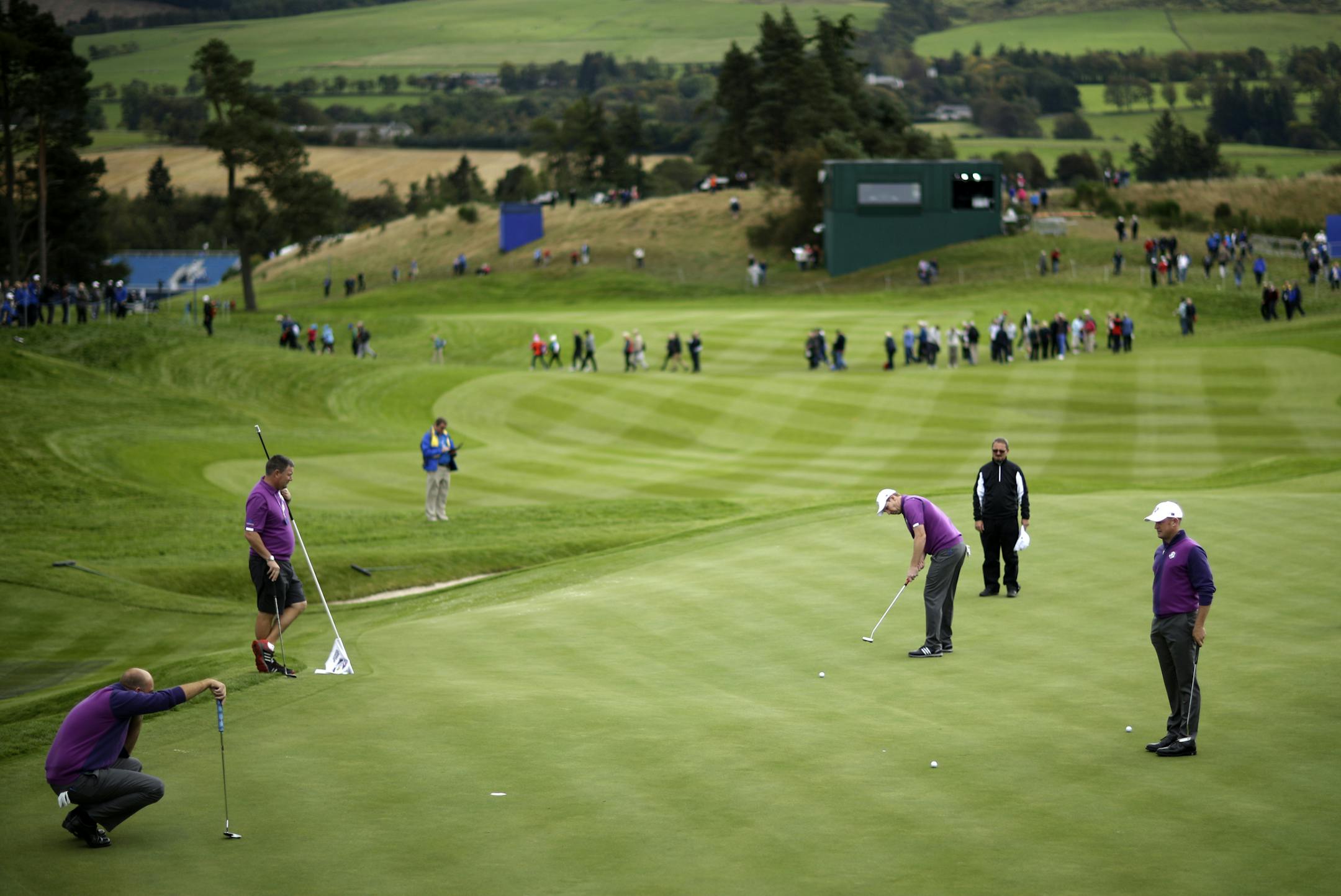 Europe’s Stephen Gallacher putts on the 18th green during a practice round ahead of the Ryder Cup golf tournament at Gleneagles, Scotland, Wednesday, Sept. 24, 2014. (AP Photo/Matt Dunham)