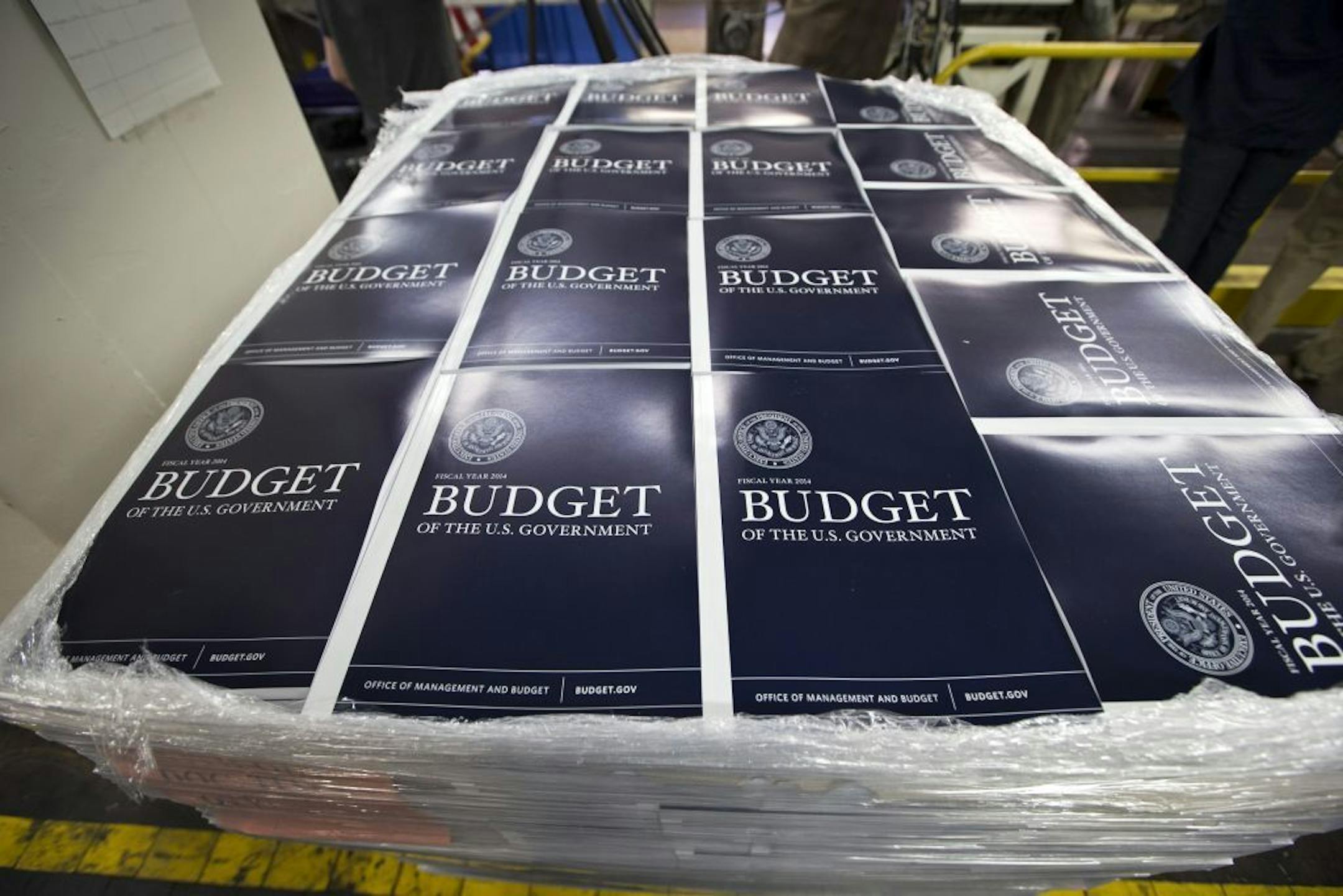 Copies of President Barack Obama's proposed federal budget plan for fiscal year 2014 are prepared for delivery at the U.S. Government Printing Office in Washington (April 8, 2013).