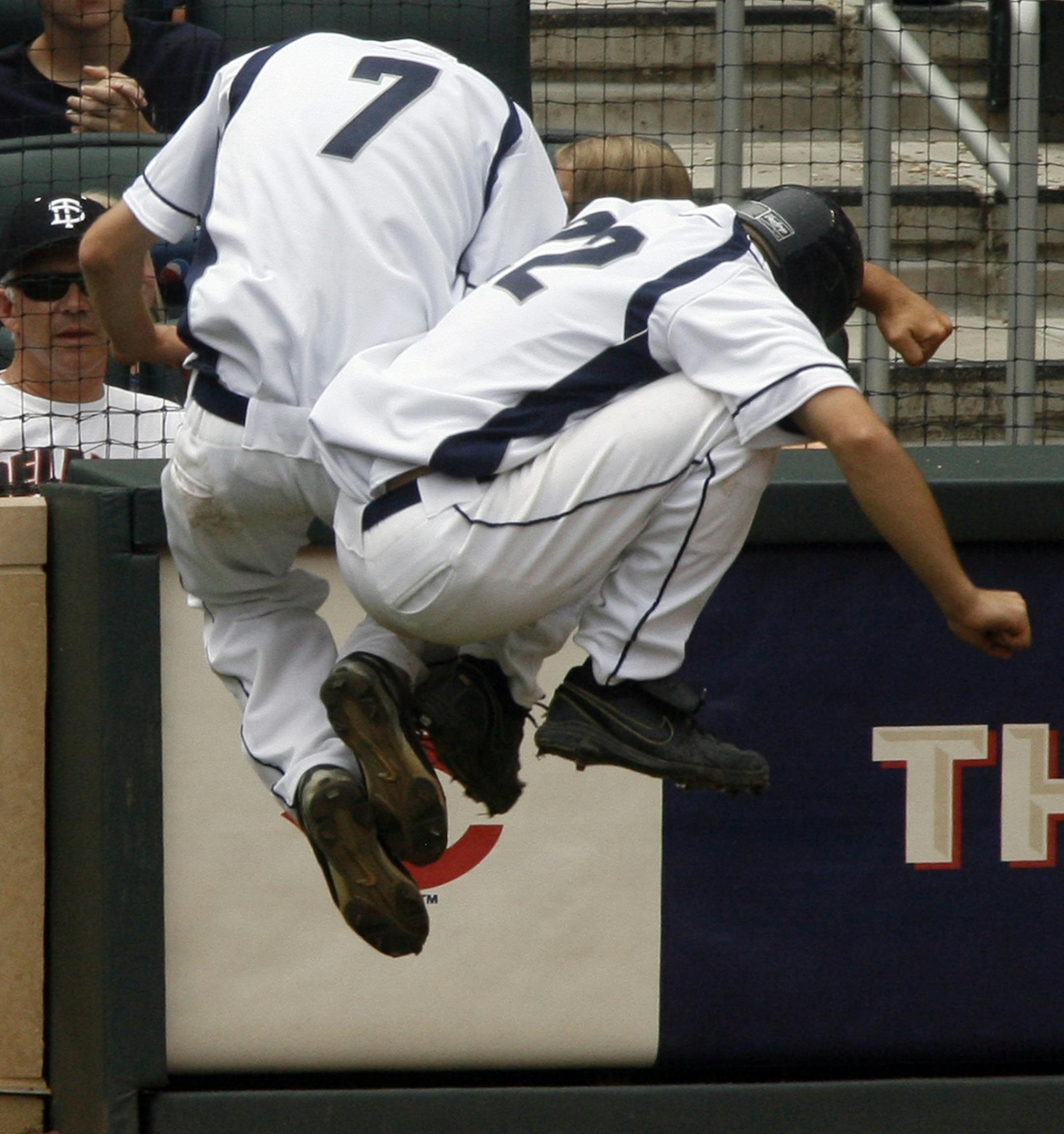 MARLIN LEVISON * mlevison@startribune.com June 19, 2010 - GENERAL INFORMATION: State Boys High School League Baseball Tournament. Class 1A. Eden Valley Watkins (EVW) vs. Sebeka. Eden Valley Watkins won the title. IN THIS PHOTO-EVW's Ryan Tri (7) and Matt Geislinger (22) congratulated one other after the team went ahead in 5th inning action.
